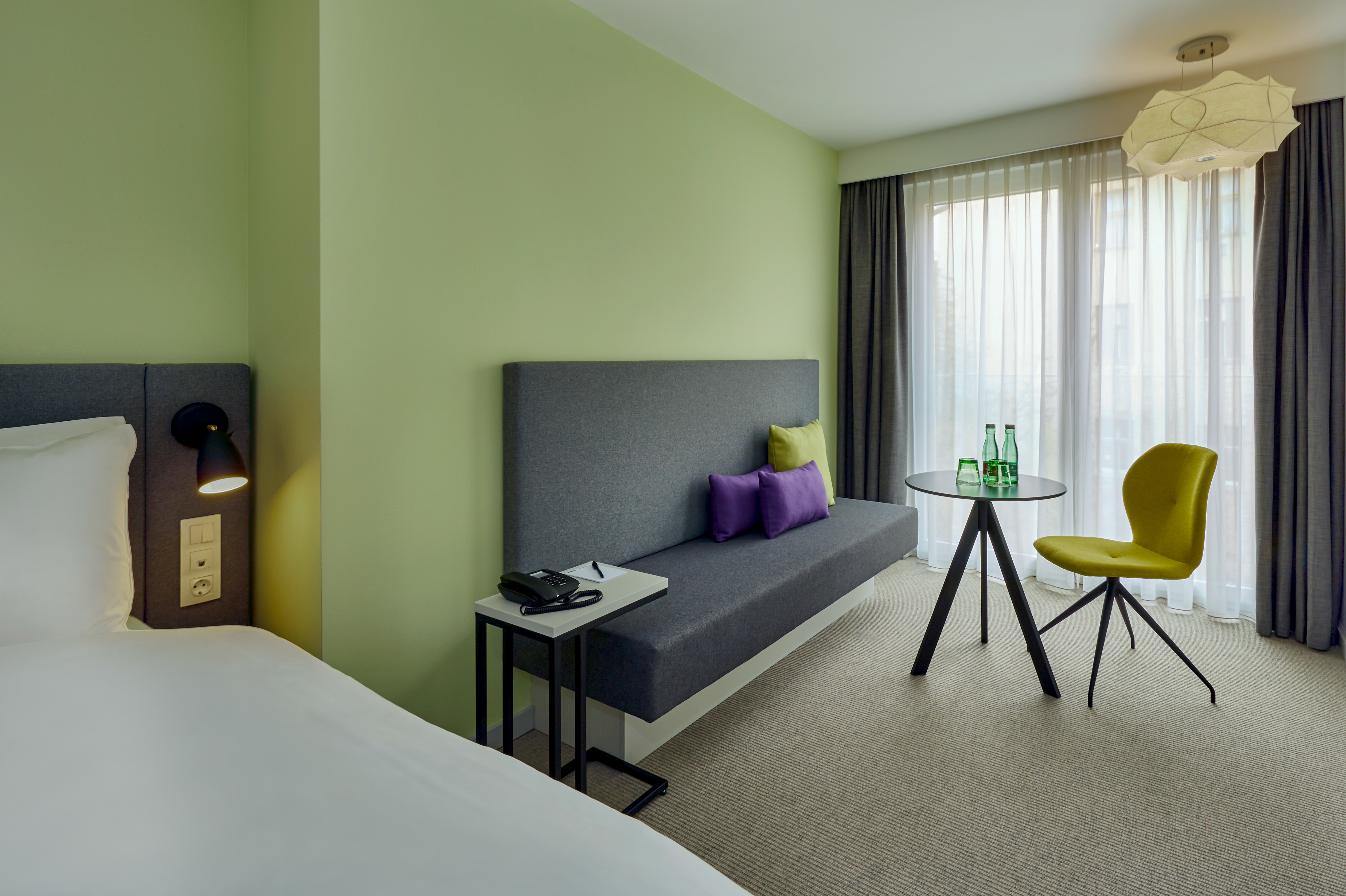 Guest room at the H+ Hotel Wien in Vienna, Other than US/Canada