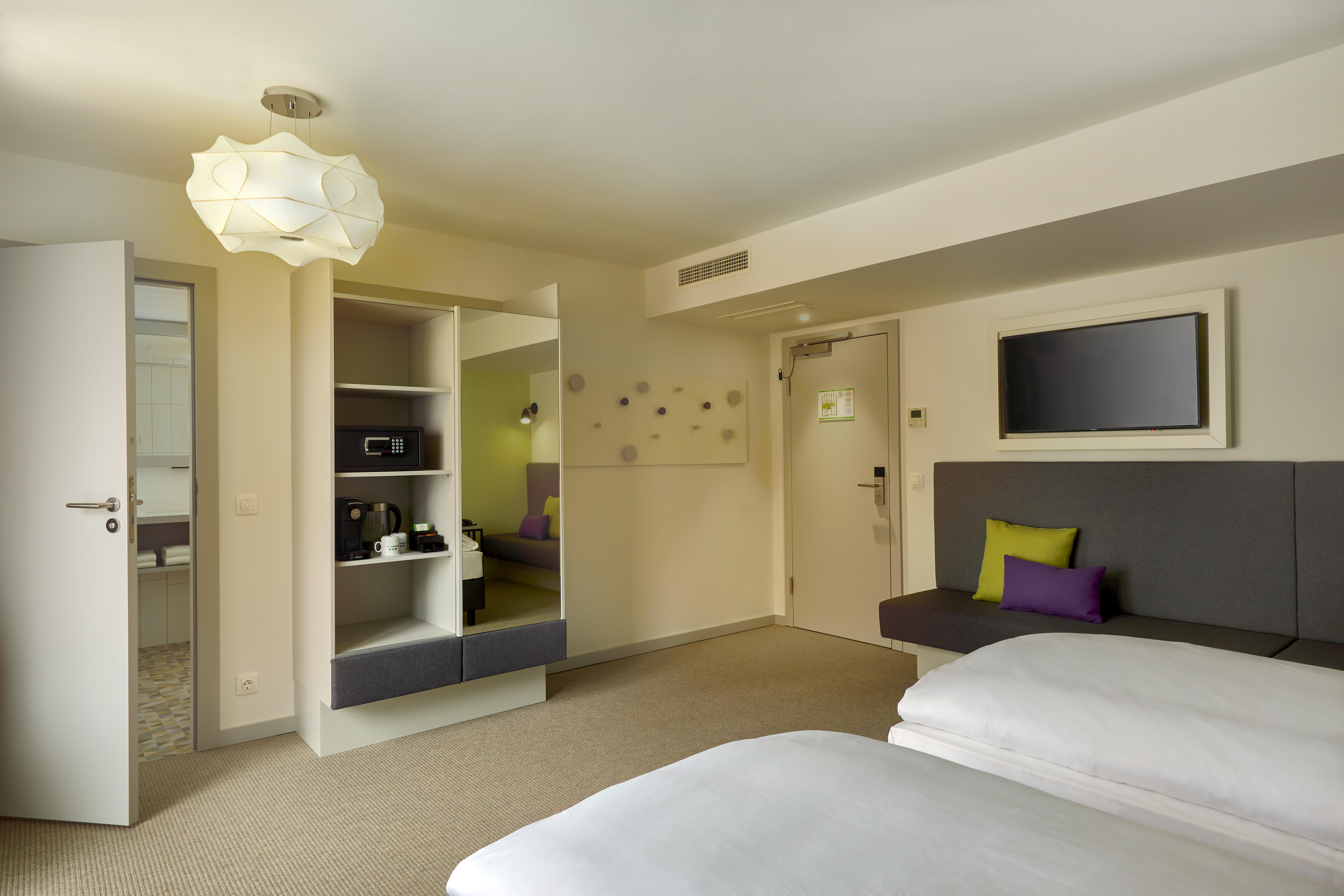 Guest room at the H+ Hotel Wien in Vienna, Other than US/Canada