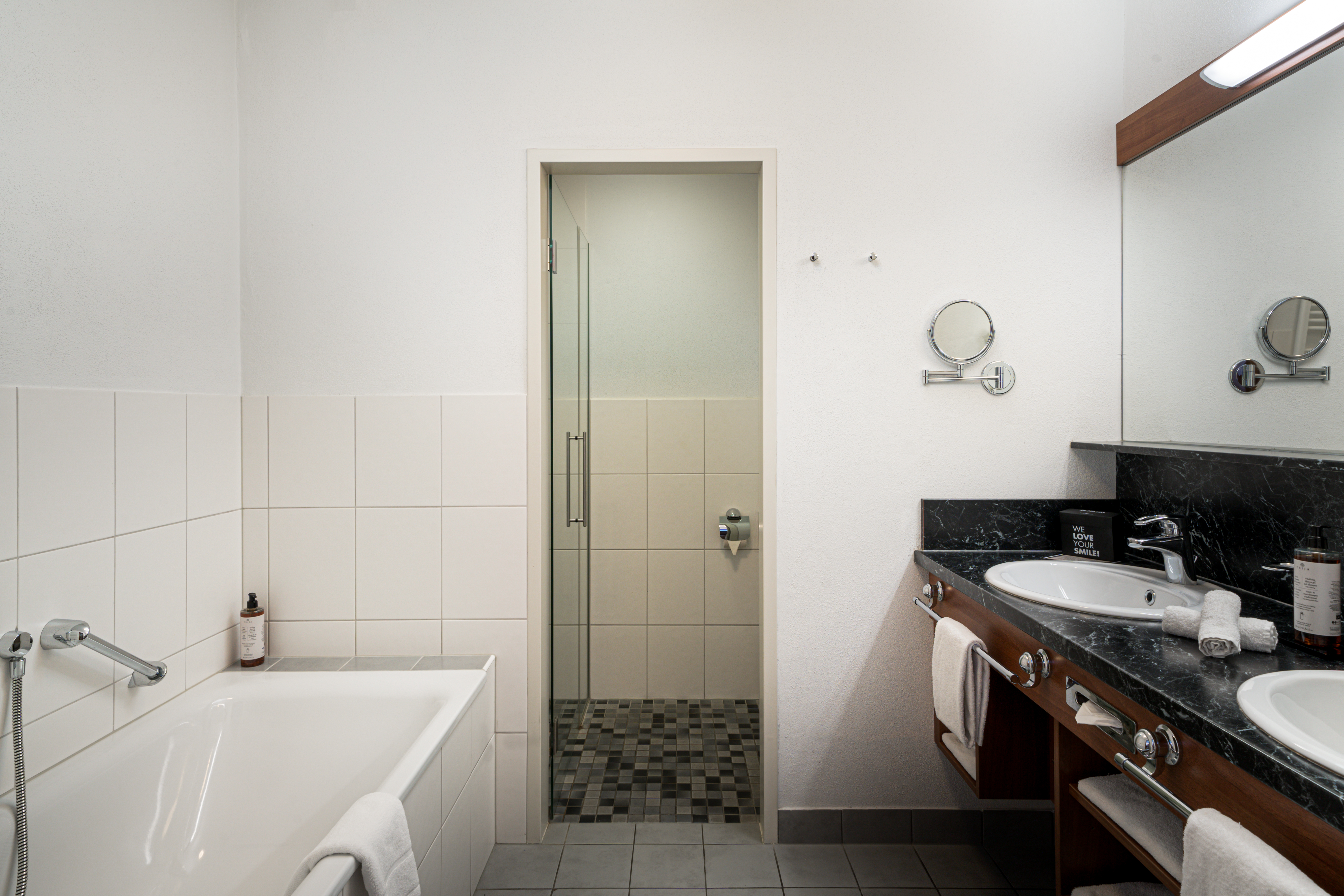 Guest room bath at the KUHOTEL Steinplatte, Trademark Collection by Wyndham in Waidring, Other than US/Canada