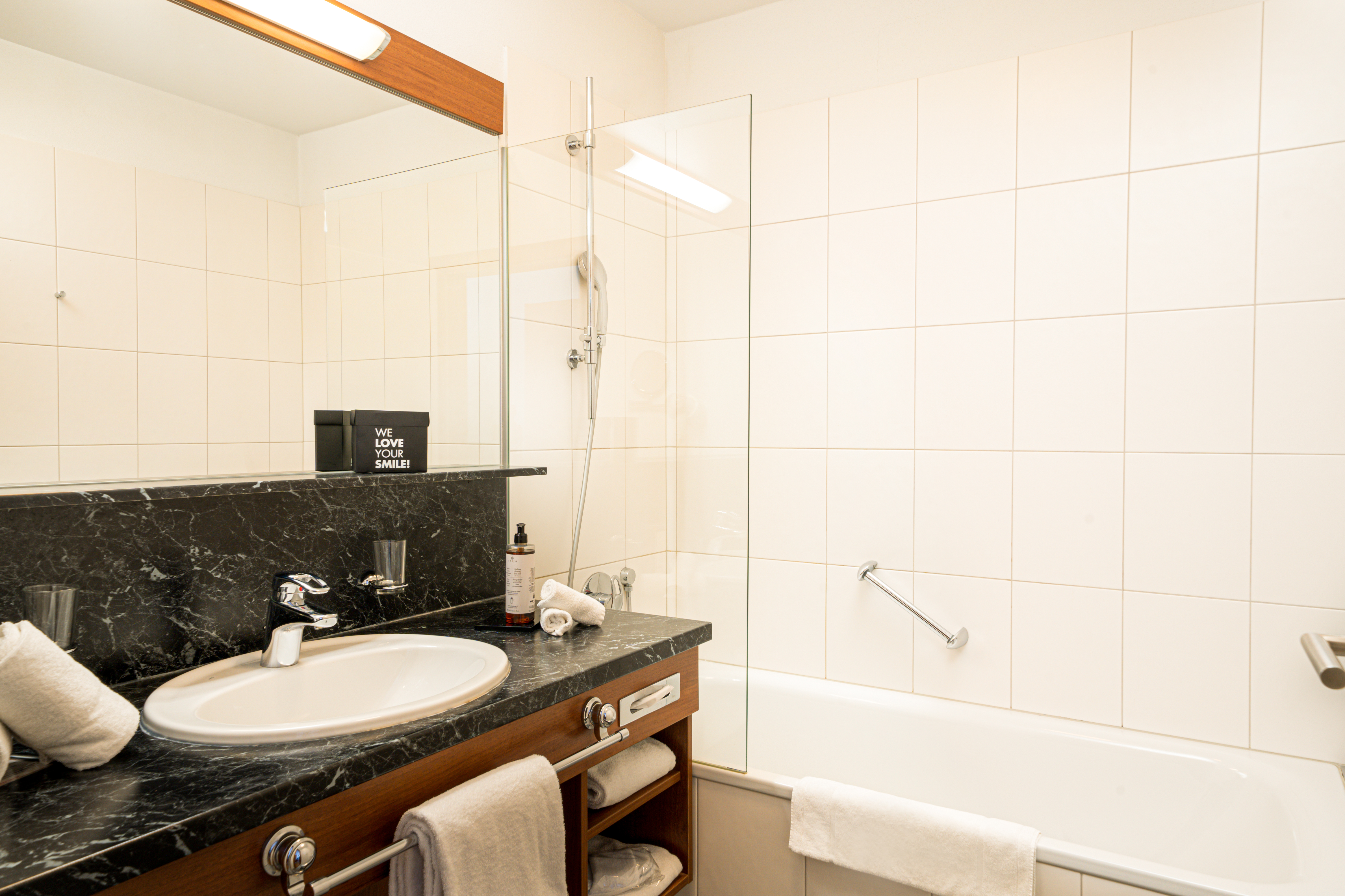 Guest room bath at the KUHOTEL Steinplatte, Trademark Collection by Wyndham in Waidring, Other than US/Canada