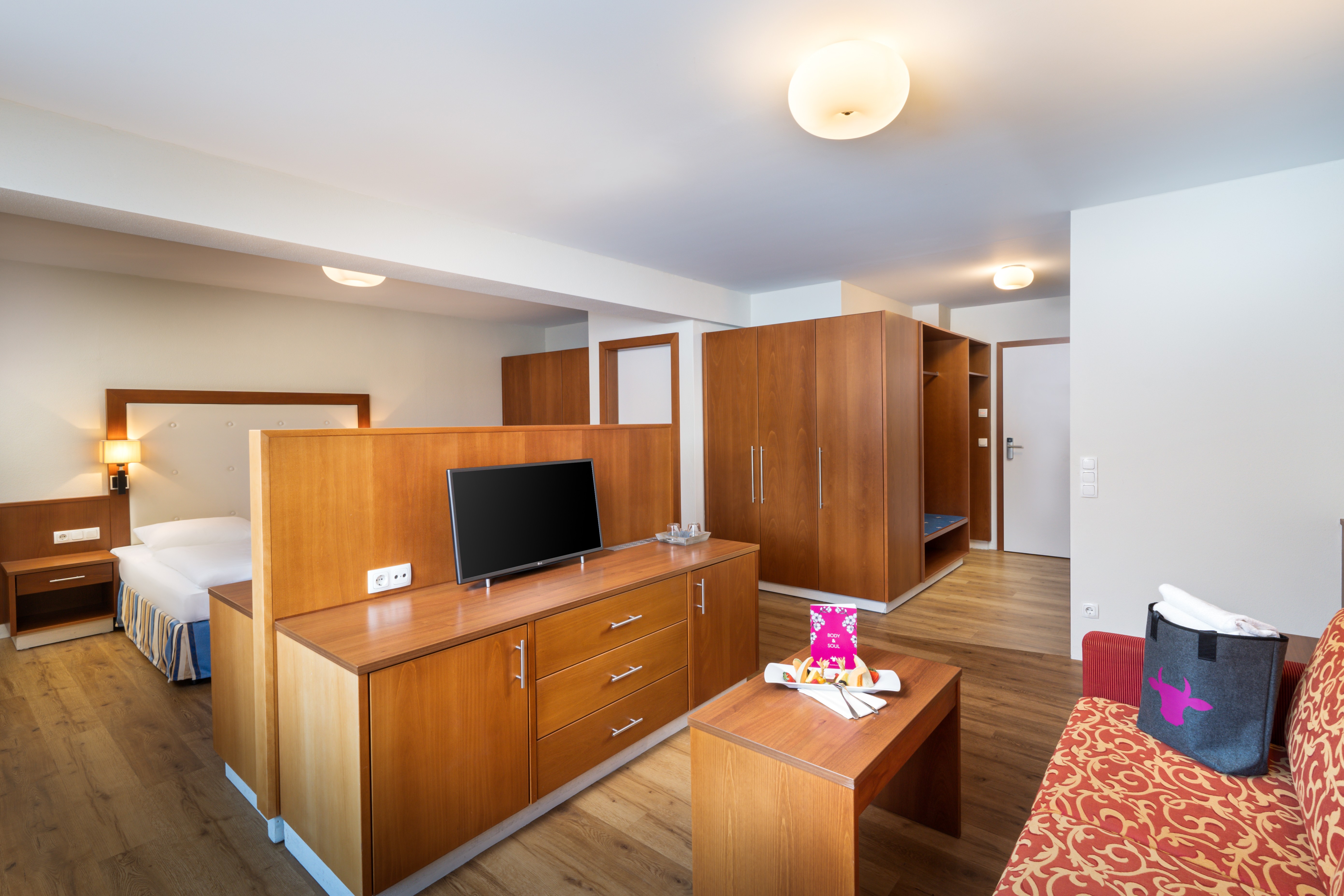 Guest room at the KUHOTEL Steinplatte, Trademark Collection by Wyndham in Waidring, Other than US/Canada