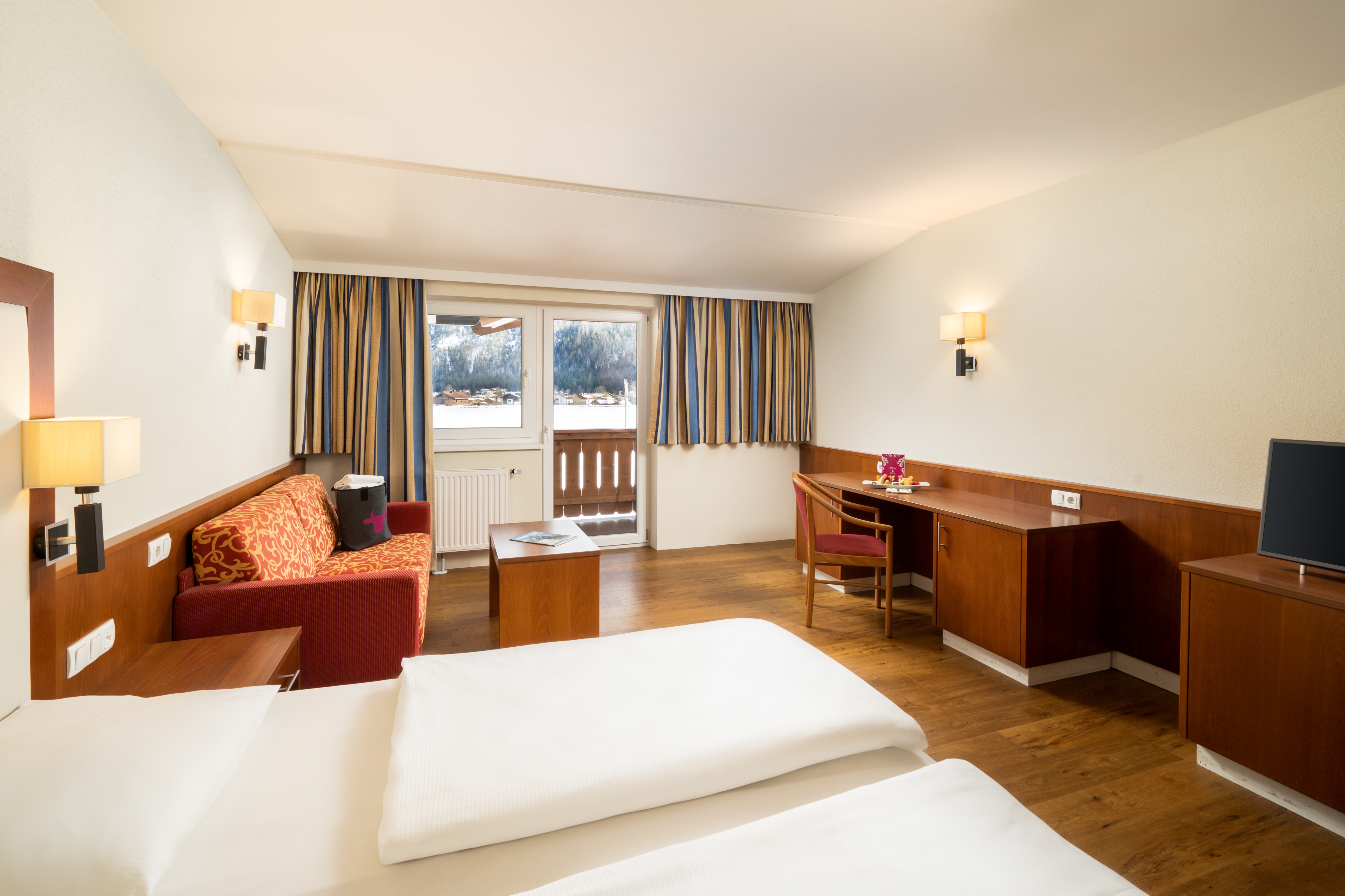 Guest room at the KUHOTEL Steinplatte, Trademark Collection by Wyndham in Waidring, Other than US/Canada