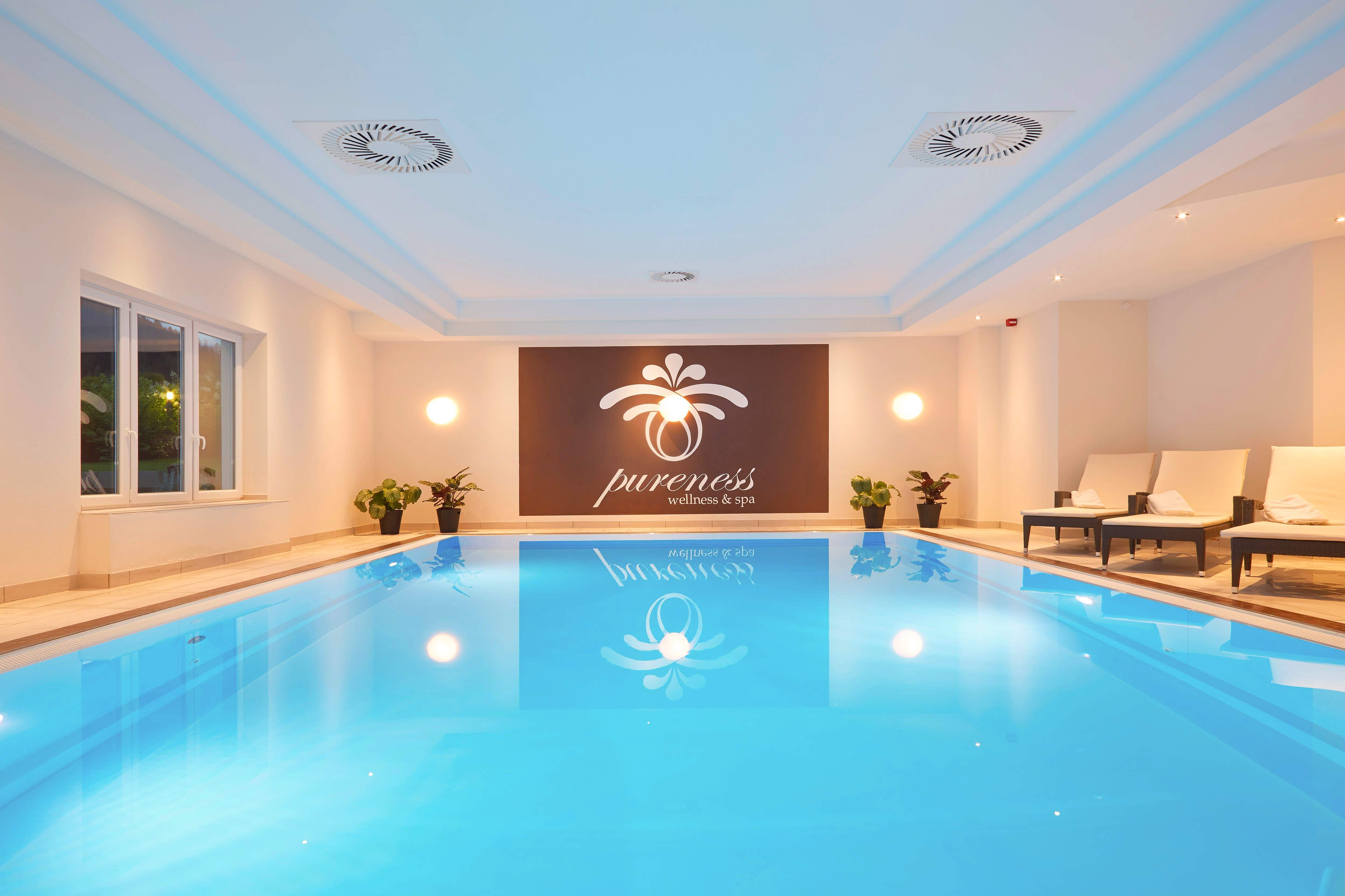 Indoor pool at the KUHOTEL Steinplatte, Trademark Collection by Wyndham in Waidring, Other than US/Canada