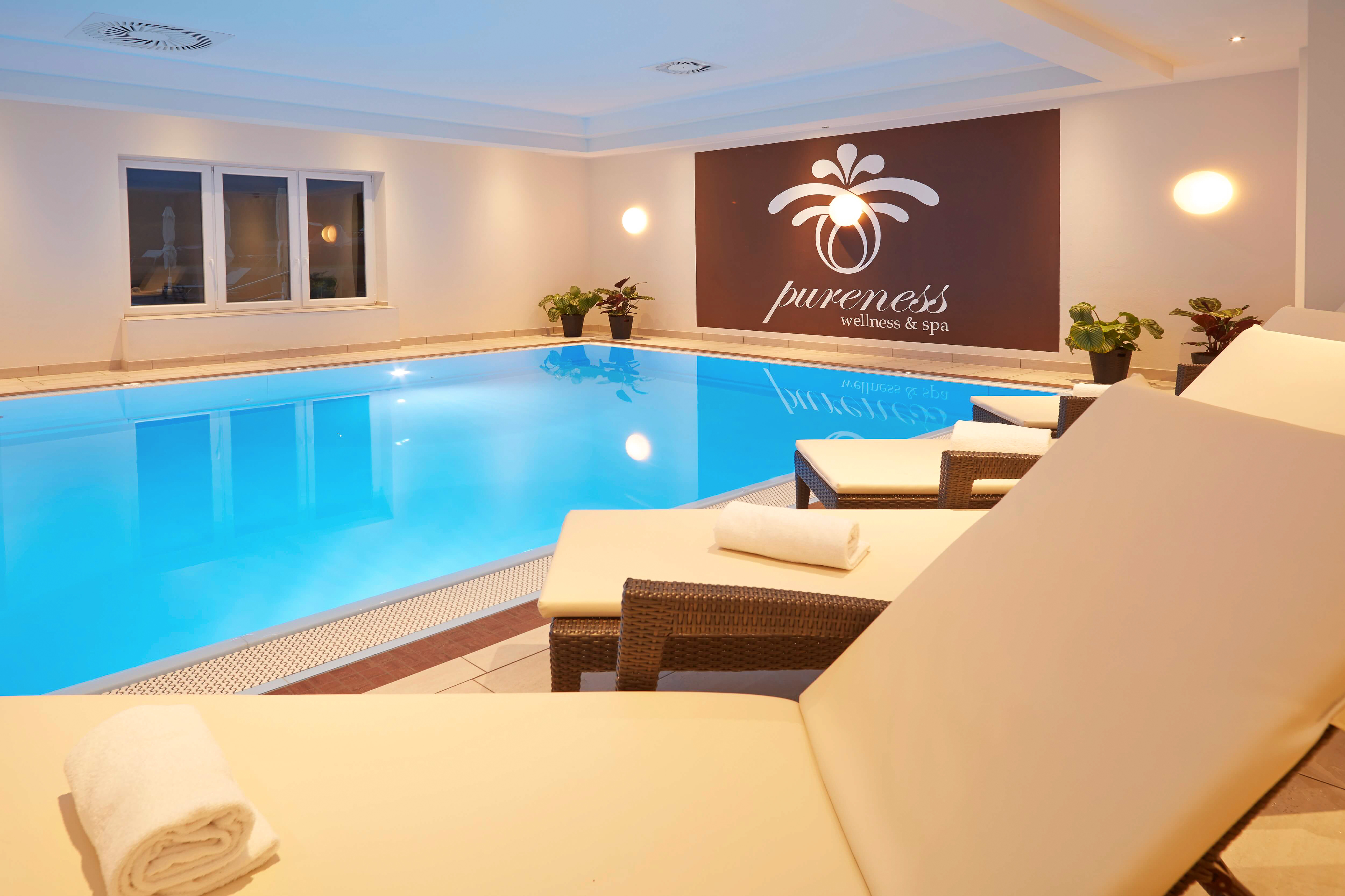 Indoor pool at the KUHOTEL Steinplatte, Trademark Collection by Wyndham in Waidring, Other than US/Canada