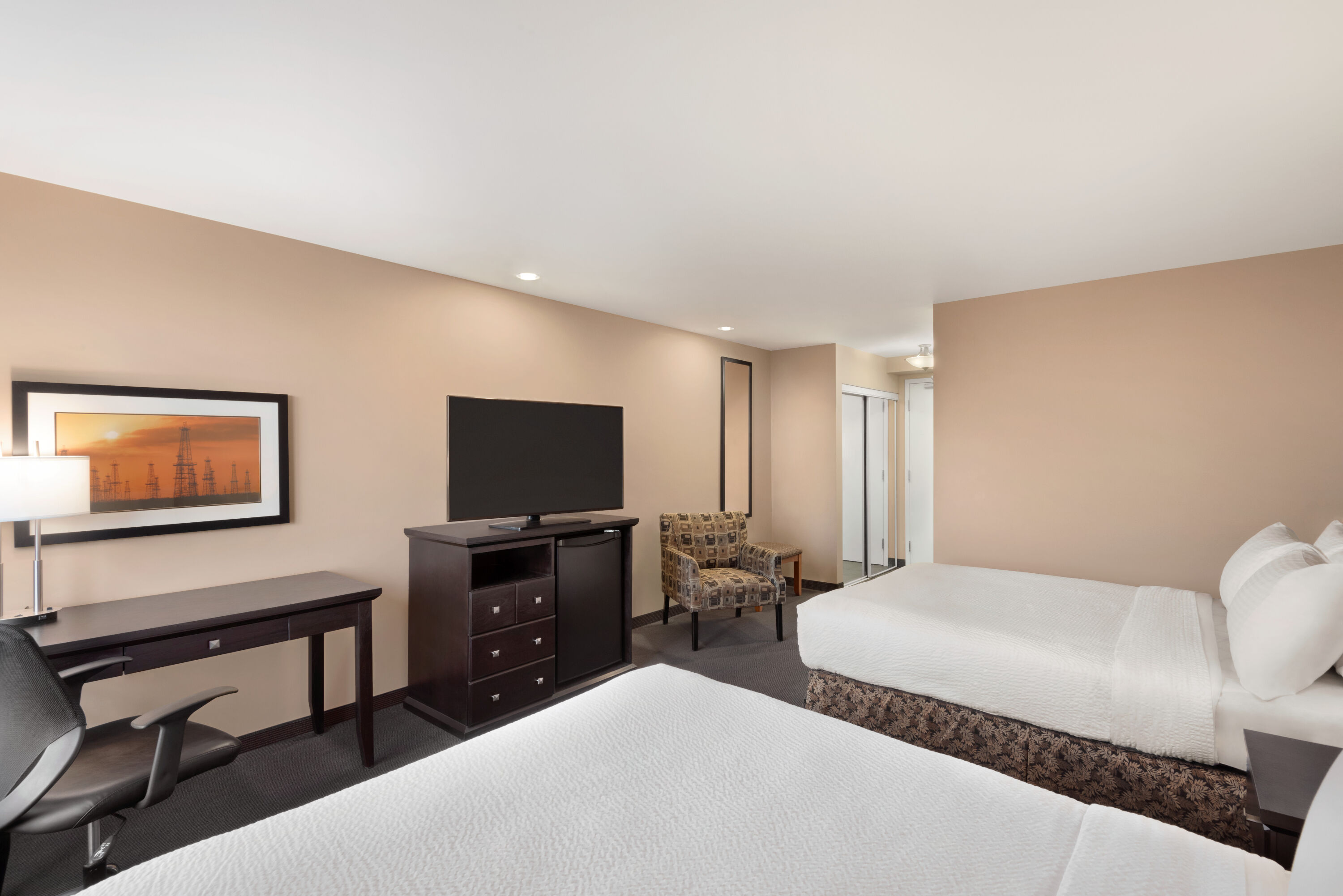 Guest room at the Royal Hotel Edmonton Airport Trademark Collection by Wyndham in Leduc, Alberta