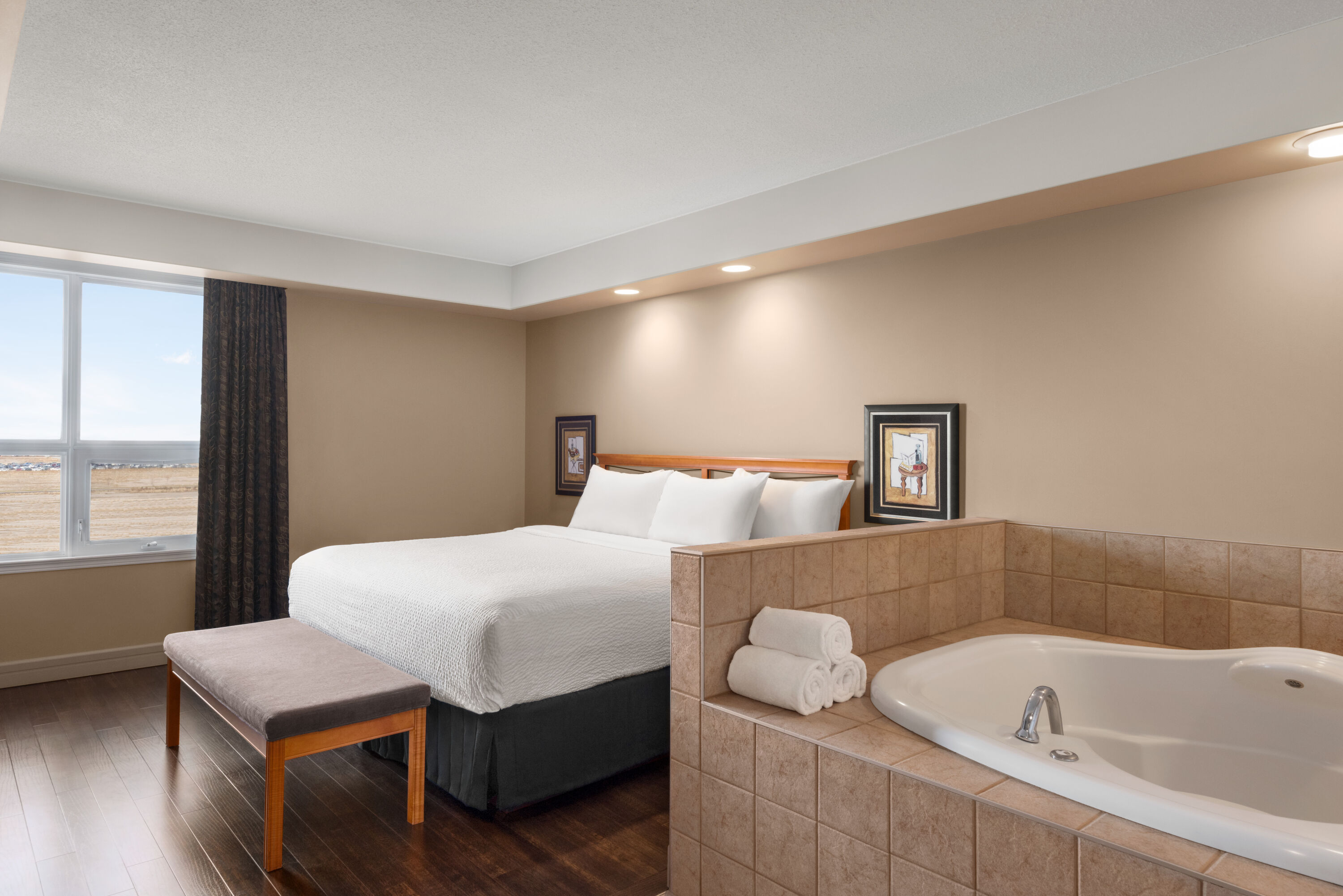 Guest room at the Royal Hotel Edmonton Airport Trademark Collection by Wyndham in Leduc, Alberta