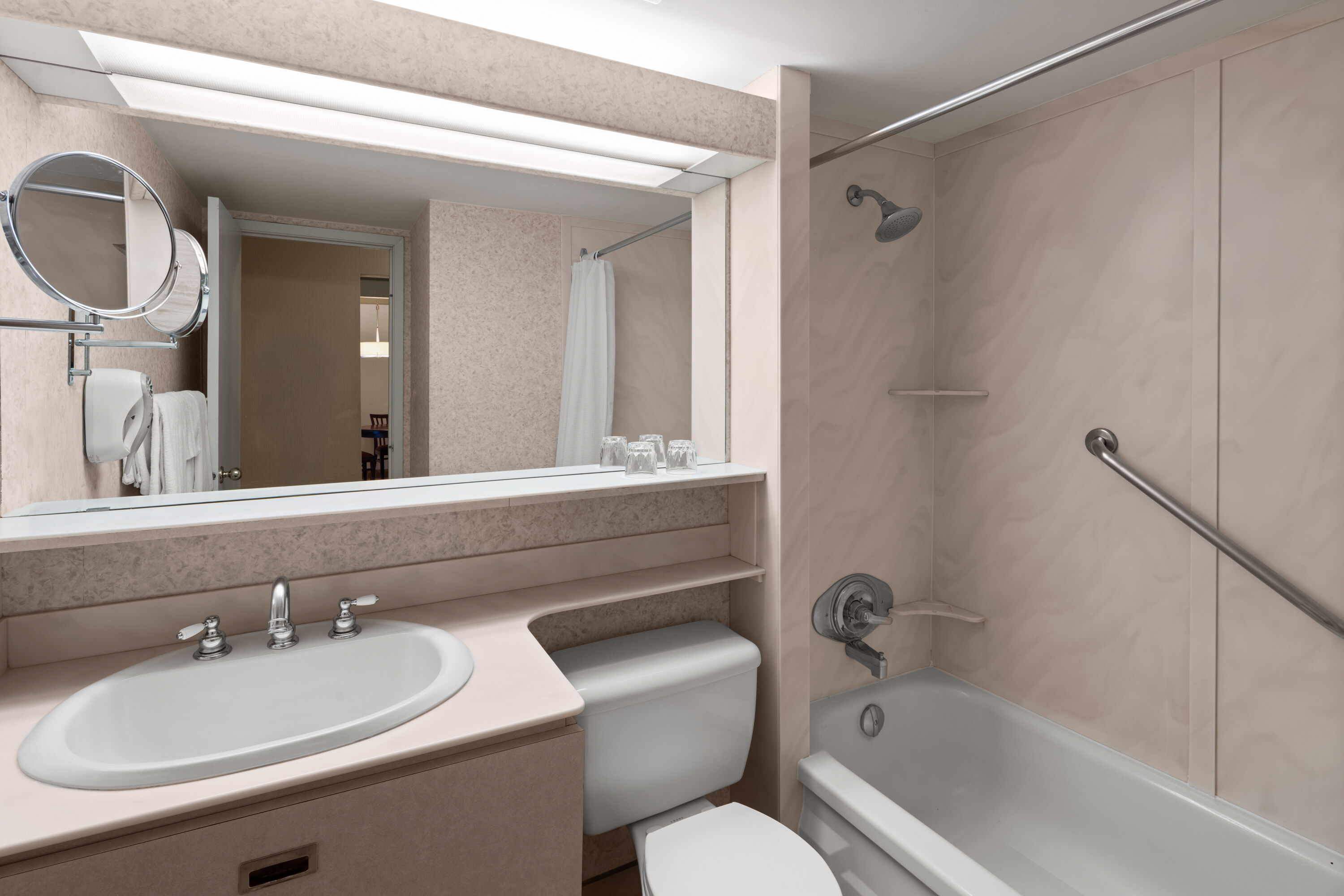 Guest room bath at the Royal Scot Hotel & Suites, Trademark Collection by Wyndham in Victoria, British Columbia