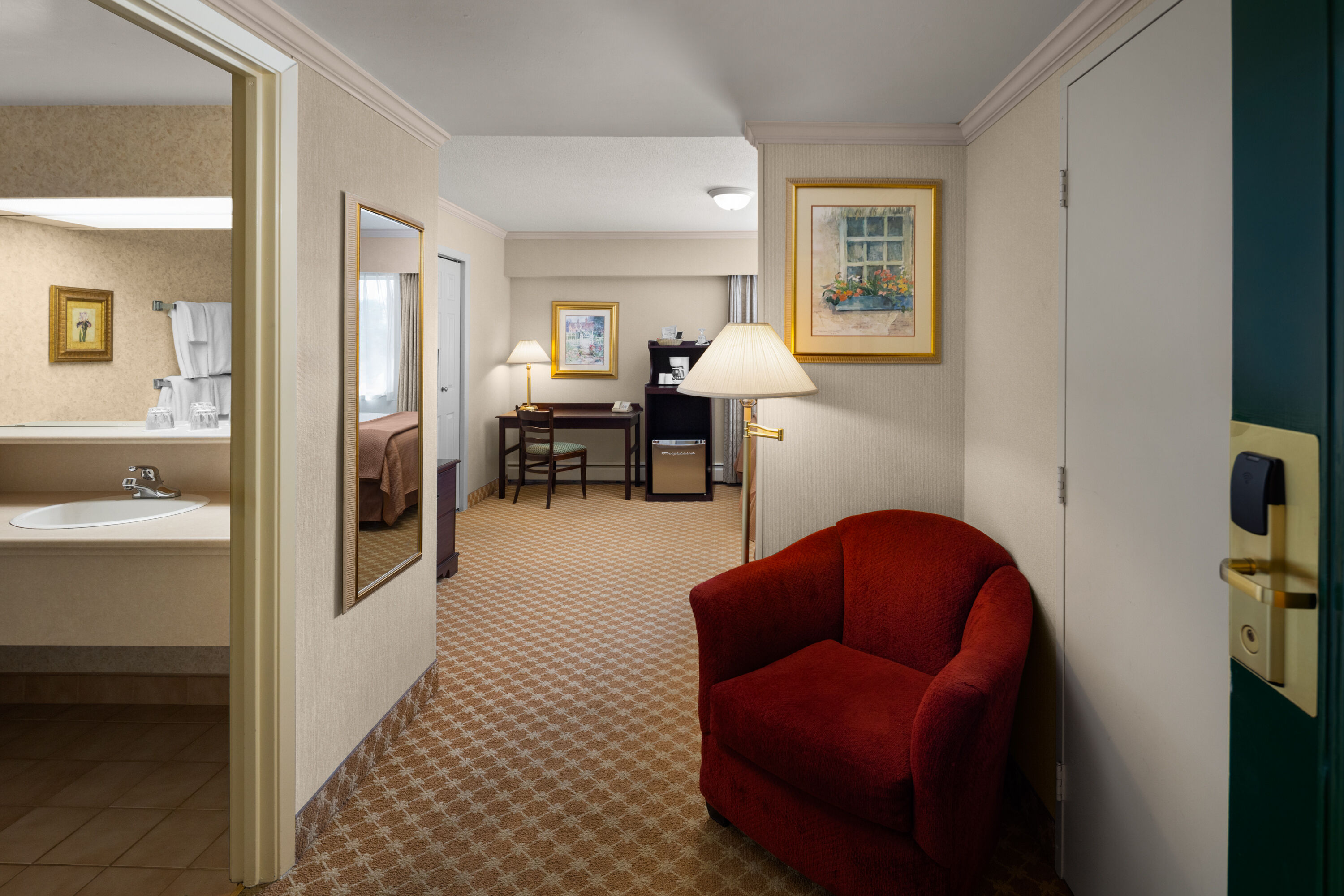 Guest room at the Royal Scot Hotel & Suites, Trademark Collection by Wyndham in Victoria, British Columbia