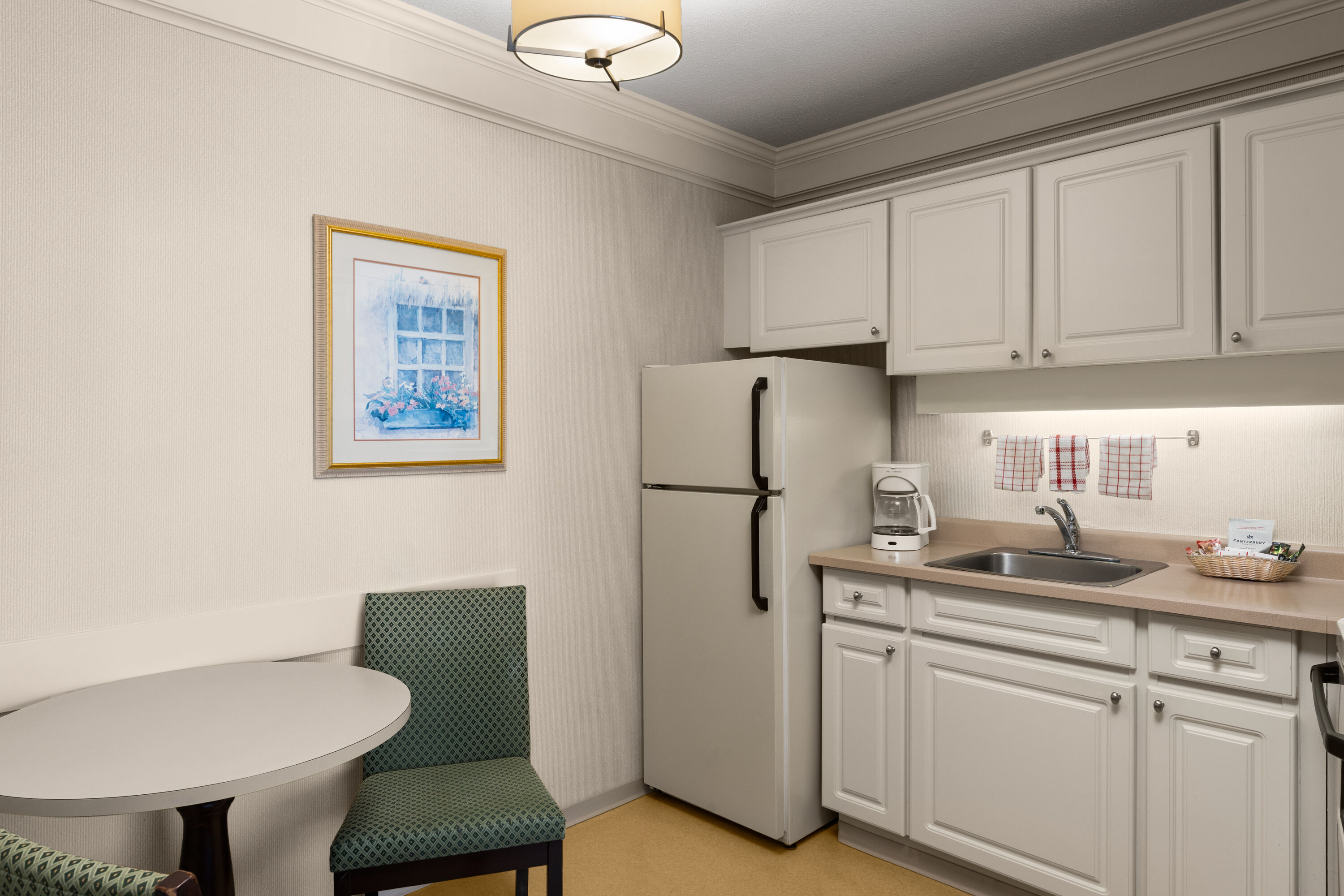 Guest room at the Royal Scot Hotel & Suites, Trademark Collection by Wyndham in Victoria, British Columbia