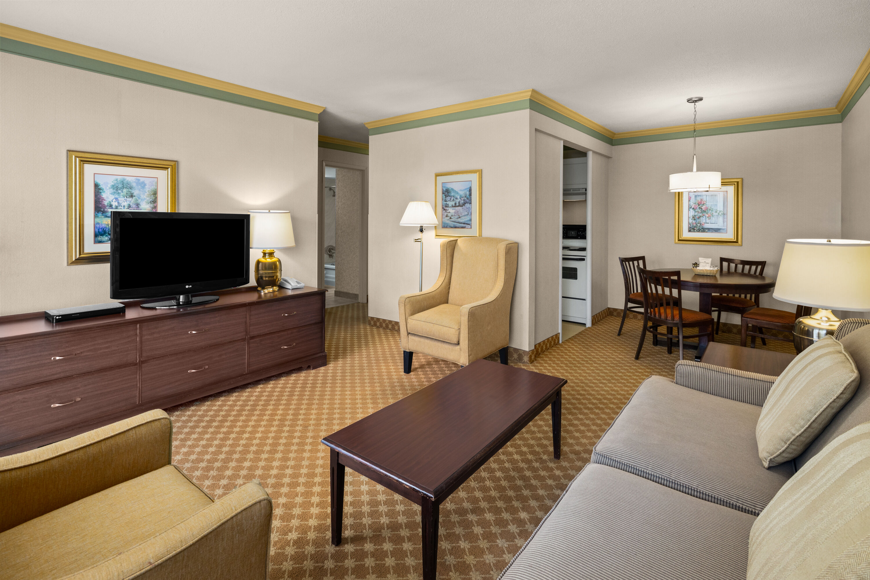 Guest room at the Royal Scot Hotel & Suites, Trademark Collection by Wyndham in Victoria, British Columbia