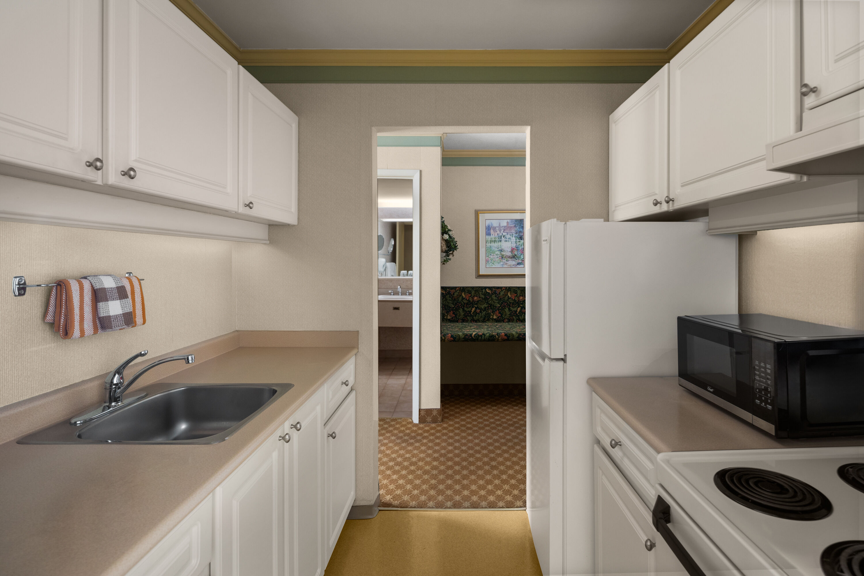 Guest room at the Royal Scot Hotel & Suites, Trademark Collection by Wyndham in Victoria, British Columbia