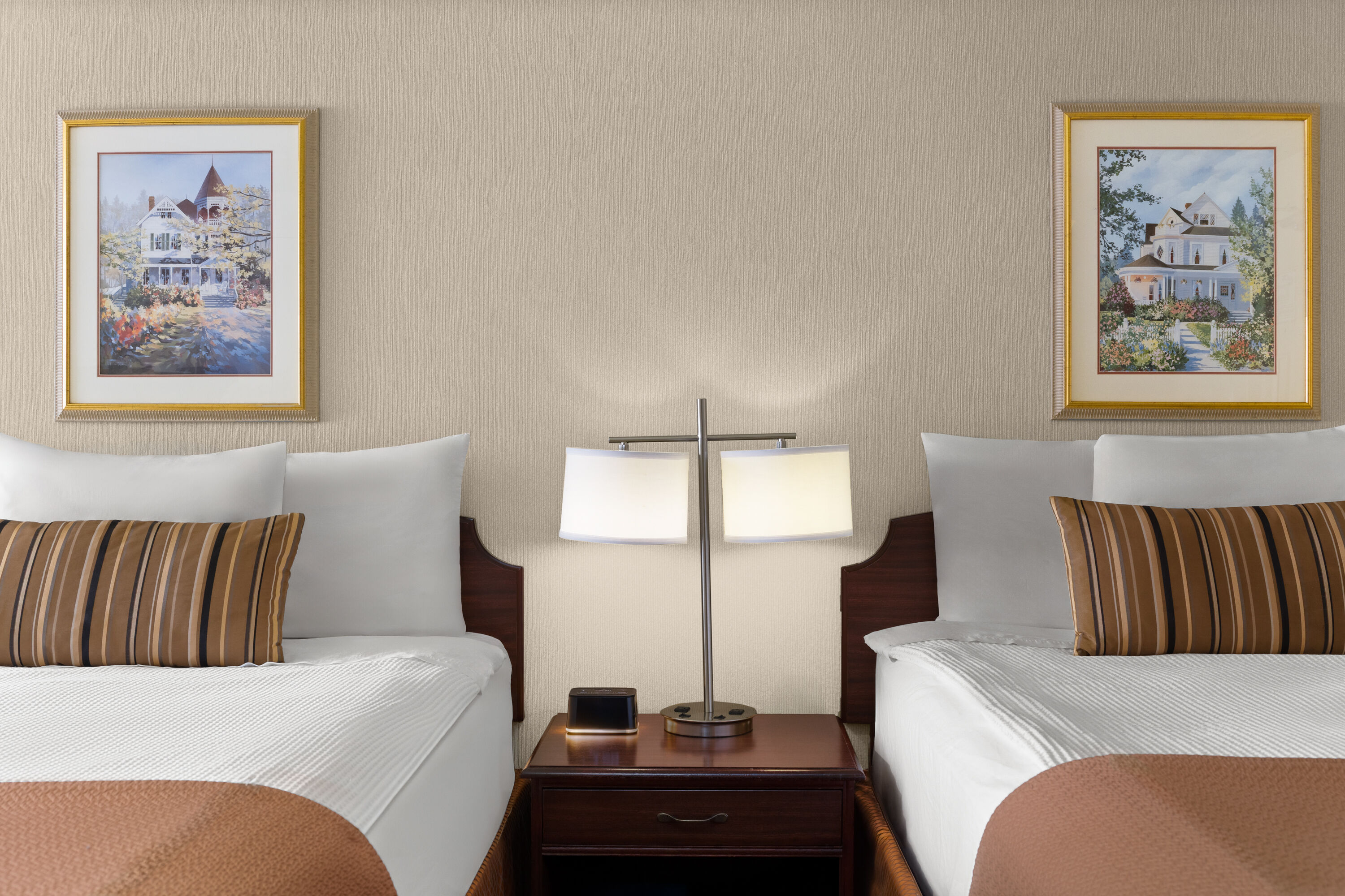 Guest room at the Royal Scot Hotel & Suites, Trademark Collection by Wyndham in Victoria, British Columbia