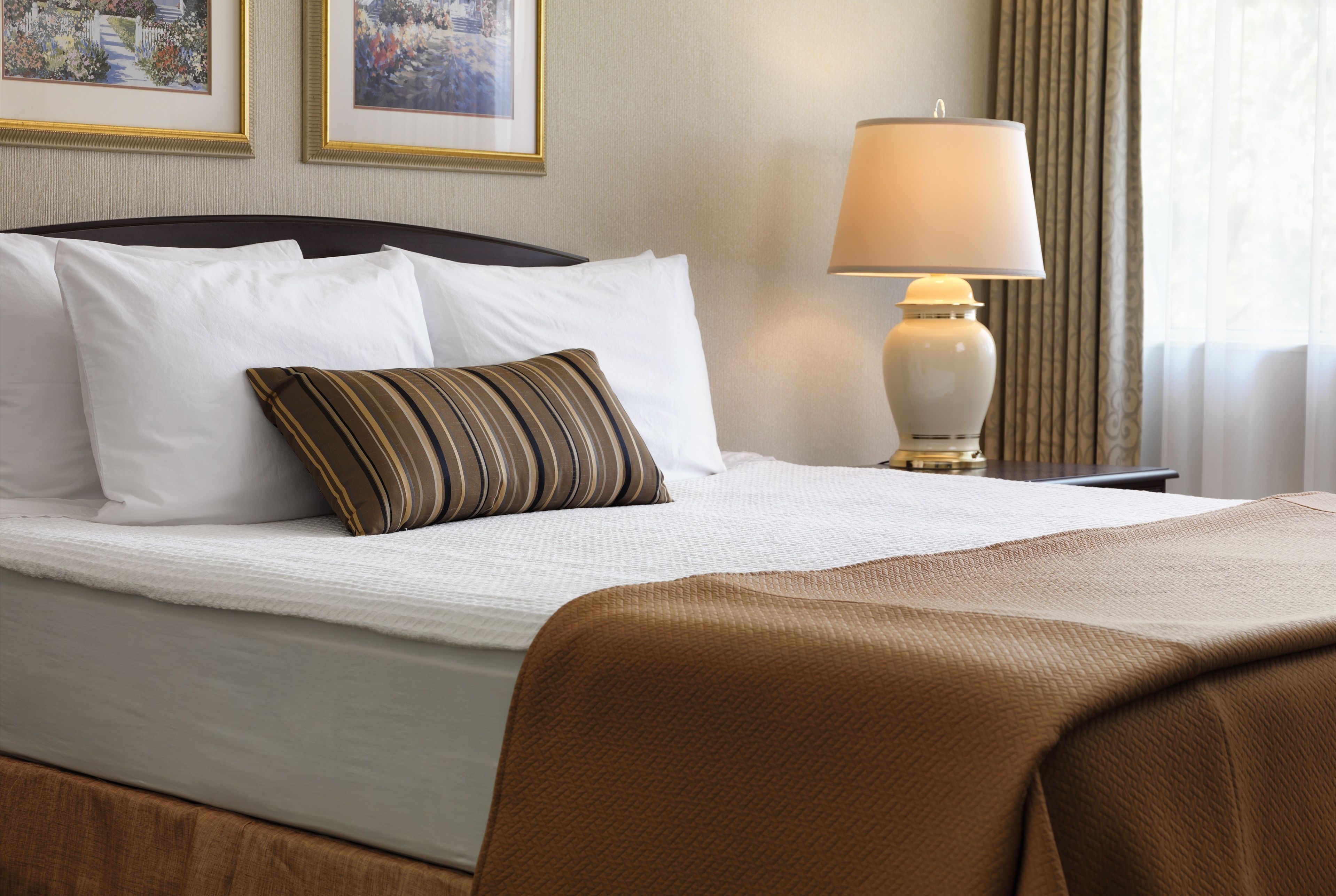 Guest room at the Royal Scot Hotel & Suites, Trademark Collection by Wyndham in Victoria, British Columbia