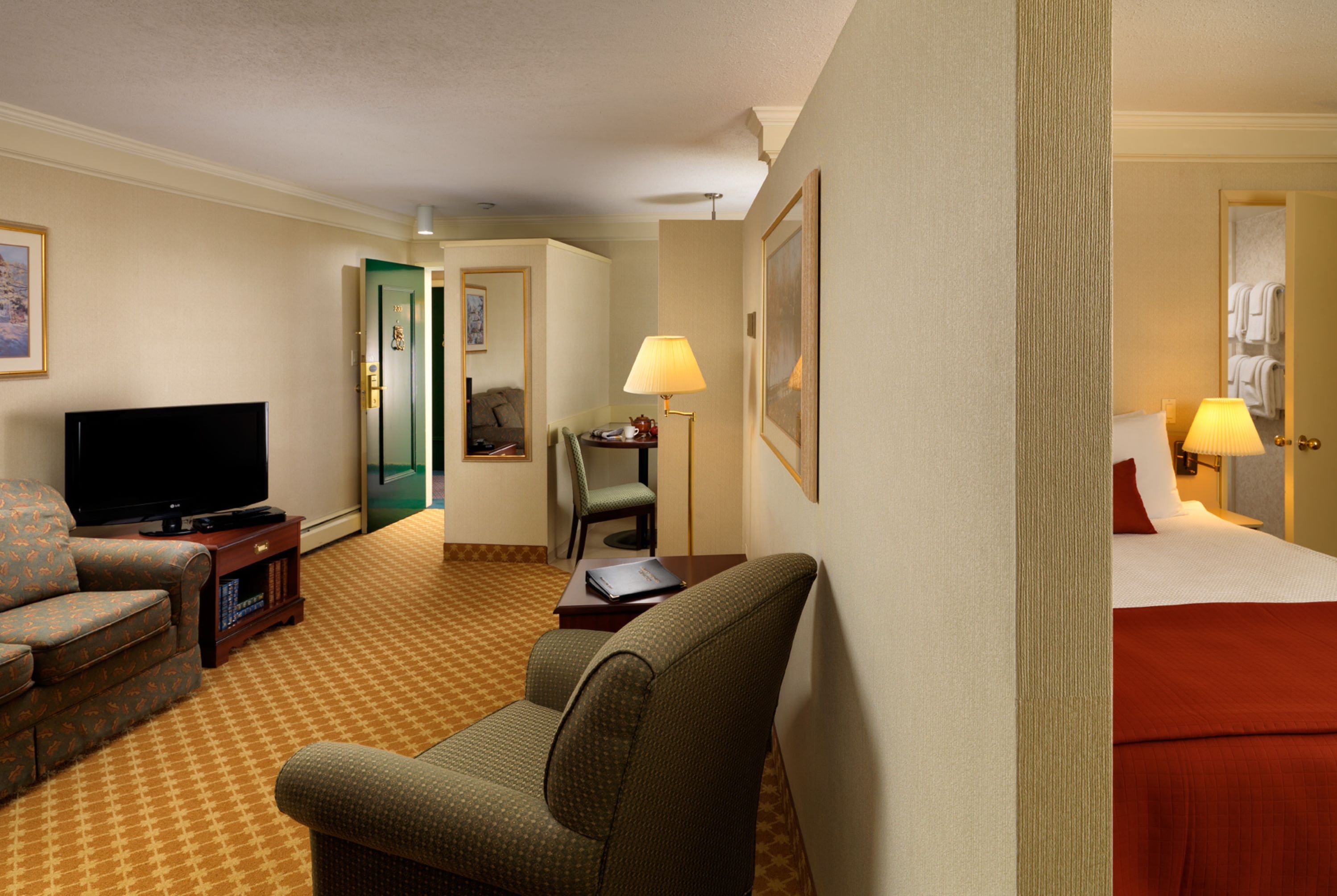 Guest room at the Royal Scot Hotel & Suites, Trademark Collection by Wyndham in Victoria, British Columbia
