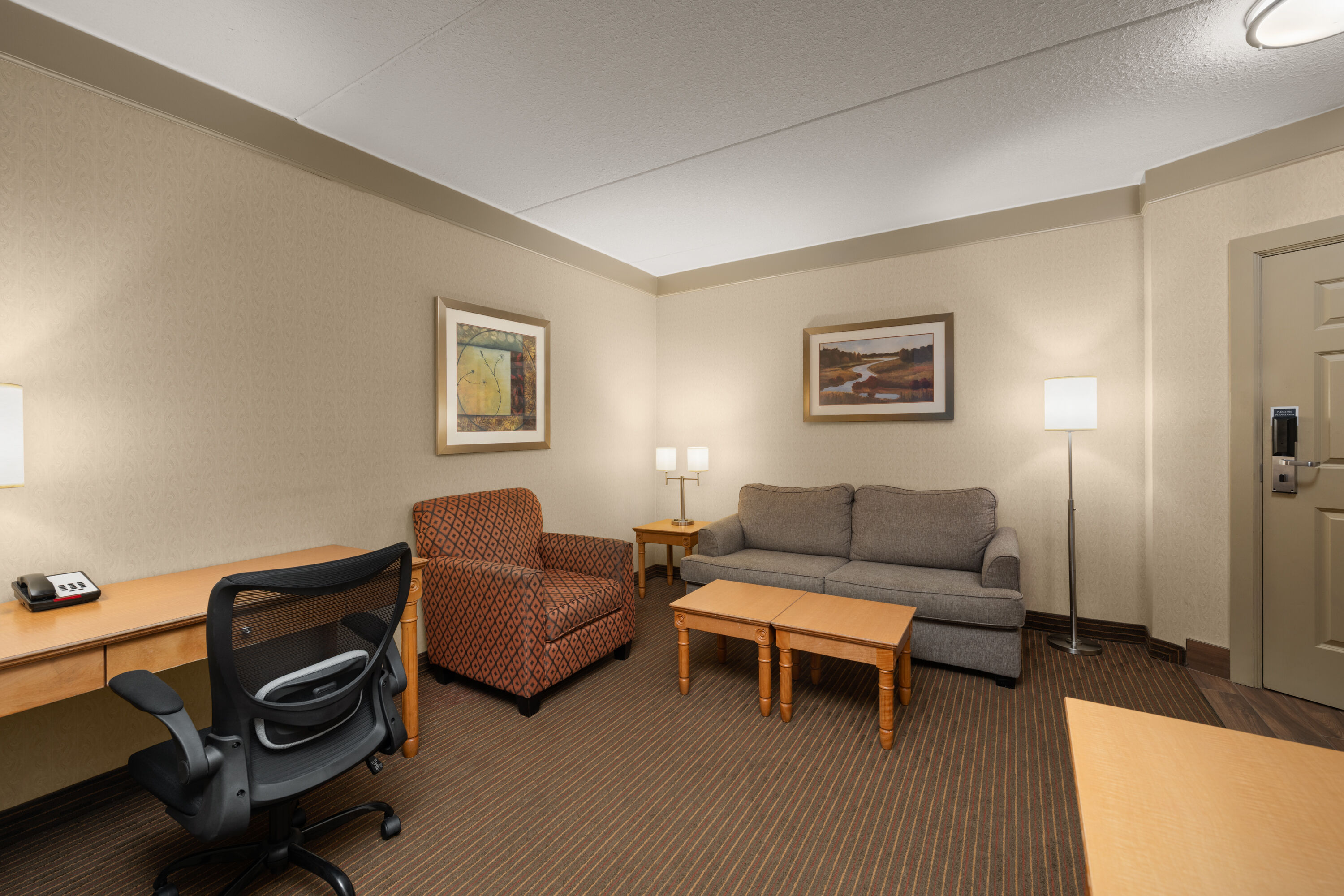 Guest room at the Waterloo Suites Hotel, Trademark Collection by Wyndham in Waterloo, Ontario