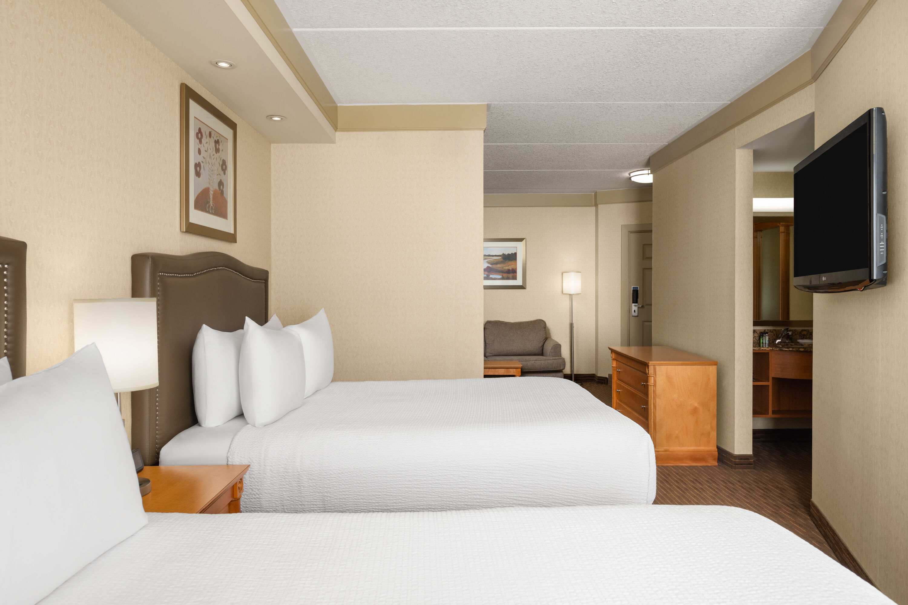 Guest room at the Waterloo Suites Hotel, Trademark Collection by Wyndham in Waterloo, Ontario