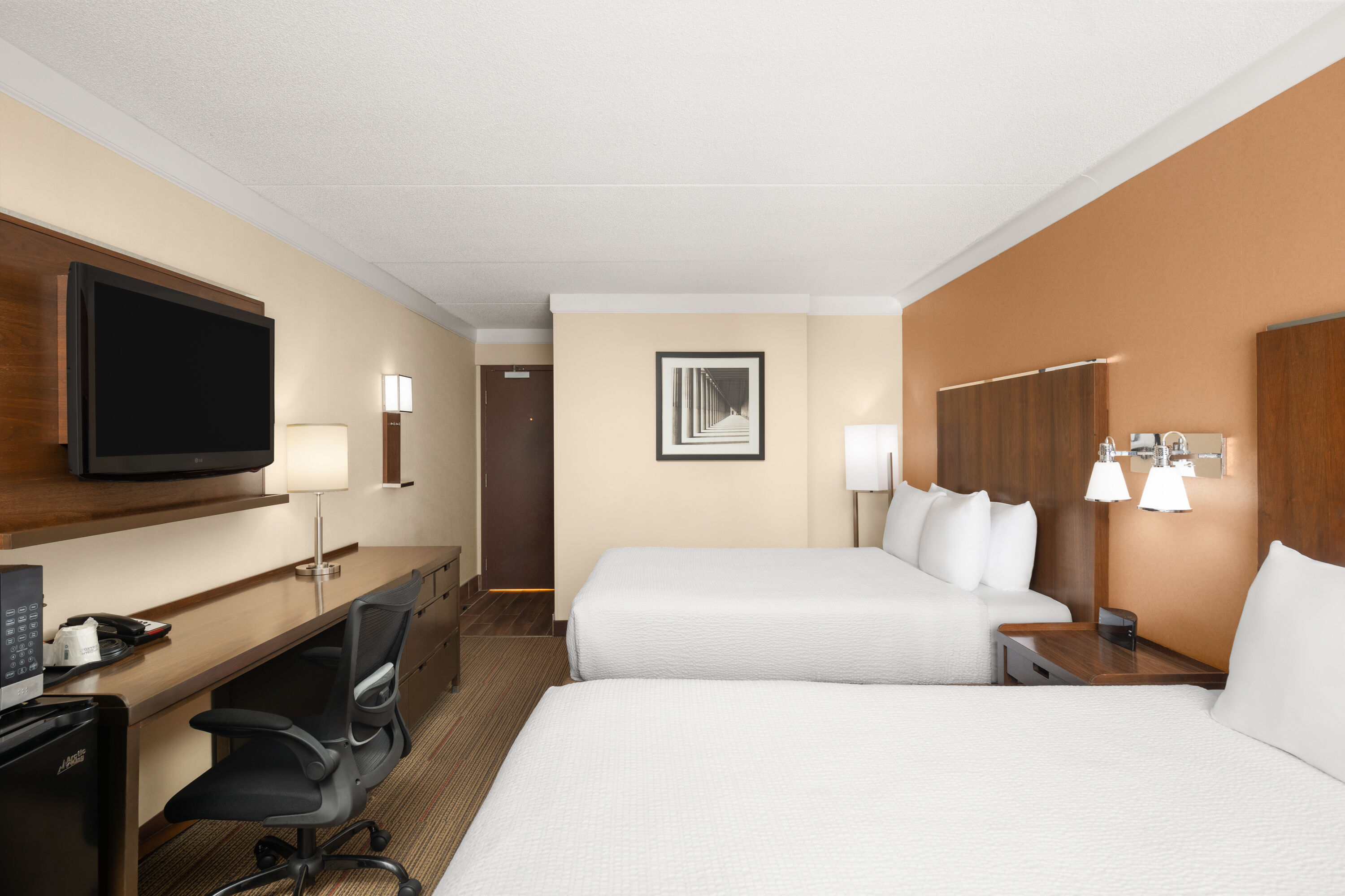 Guest room at the Waterloo Suites Hotel, Trademark Collection by Wyndham in Waterloo, Ontario