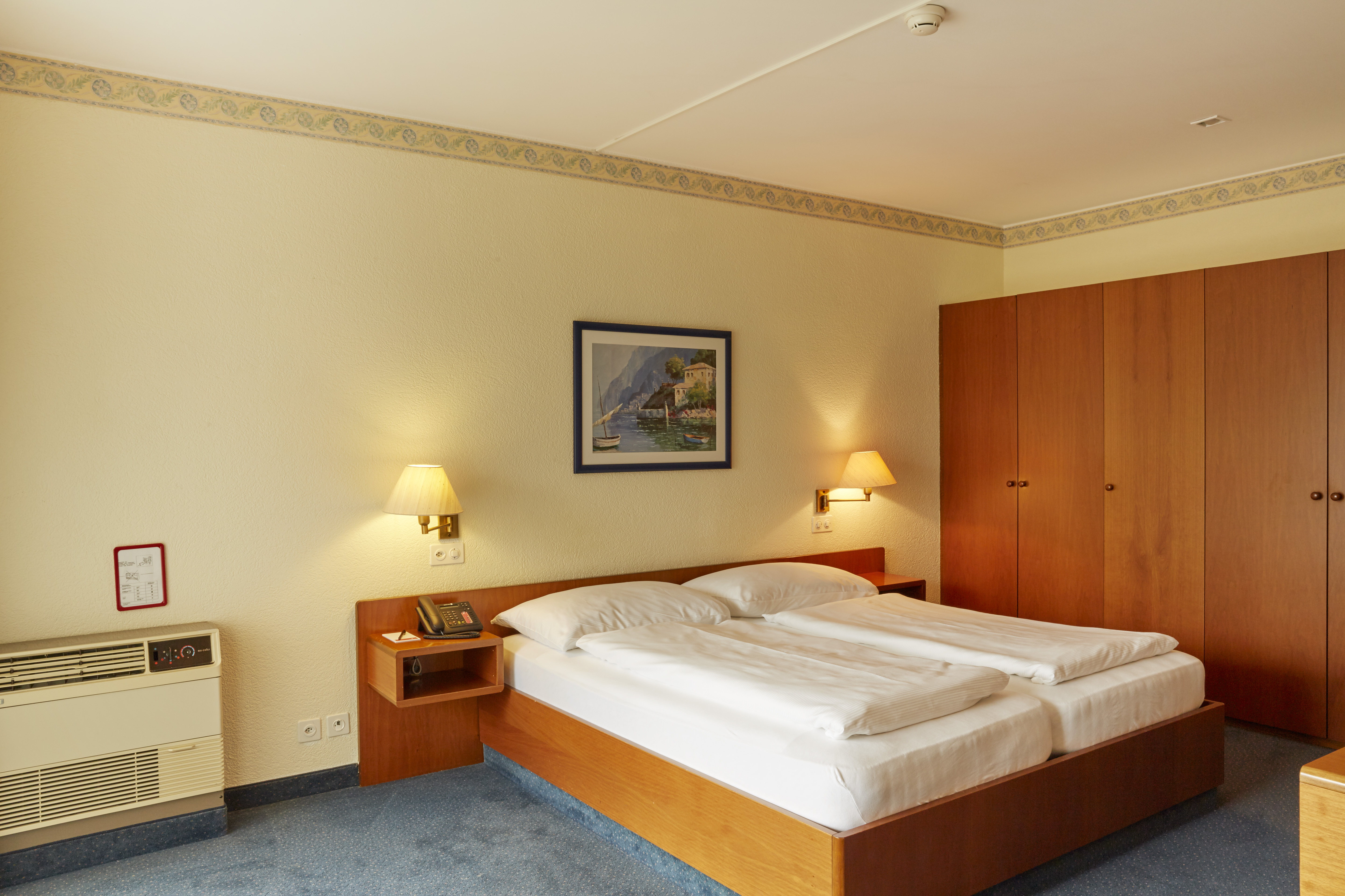 Guest room at the H4 Hotel Arcadia Locarno in Locarno, Other than US/Canada