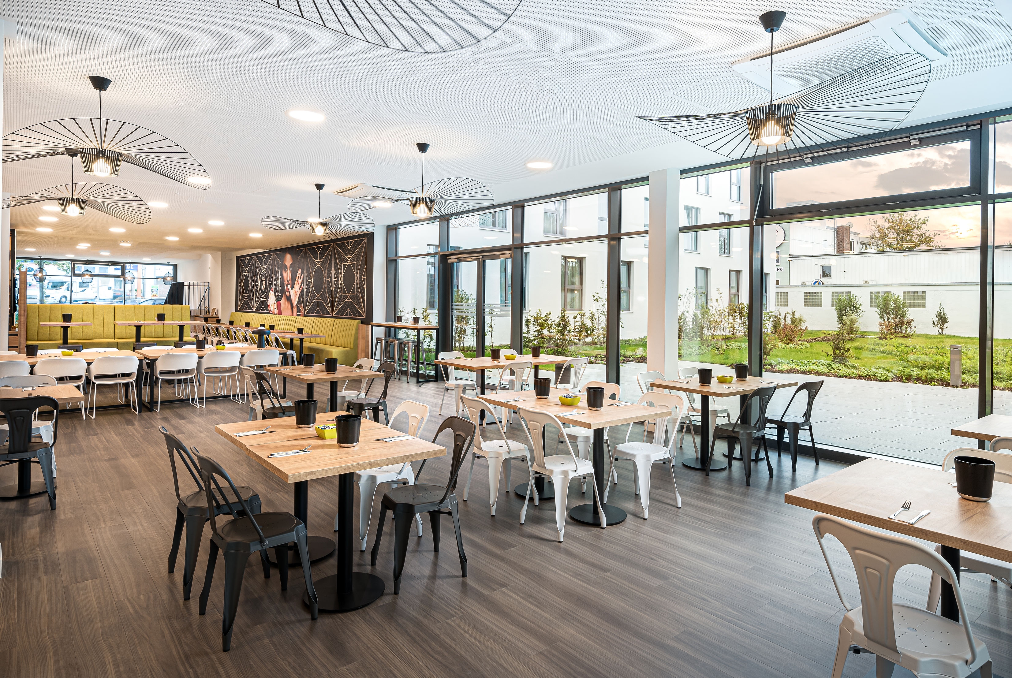elaya hotel augsburg, Trademark by Wyndham restaurant breakfast area with seating in Augsburg, Other than US/Canada