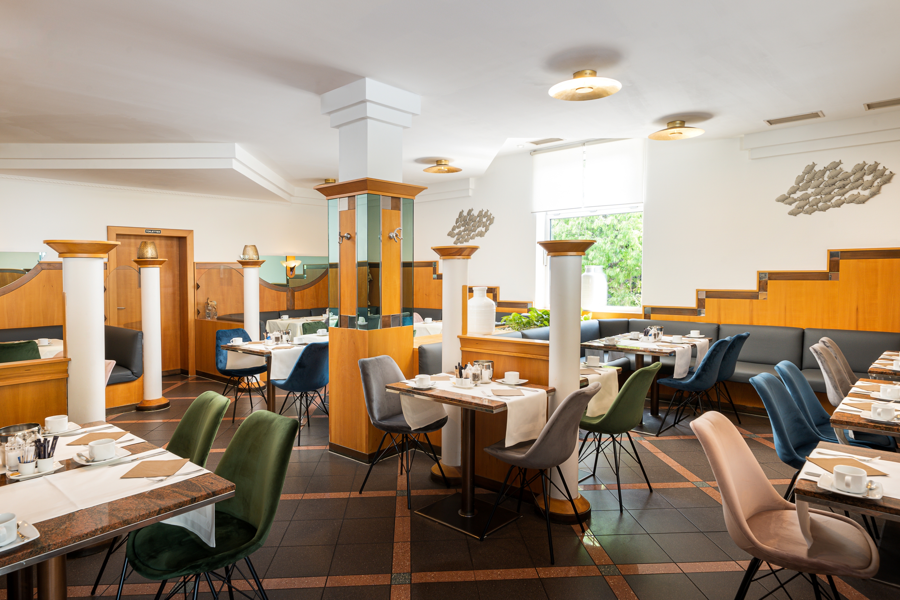 QU Hotel, Trademark Collection by Wyndham restaurant breakfast area with seating in Augsburg, Other than US/Canada