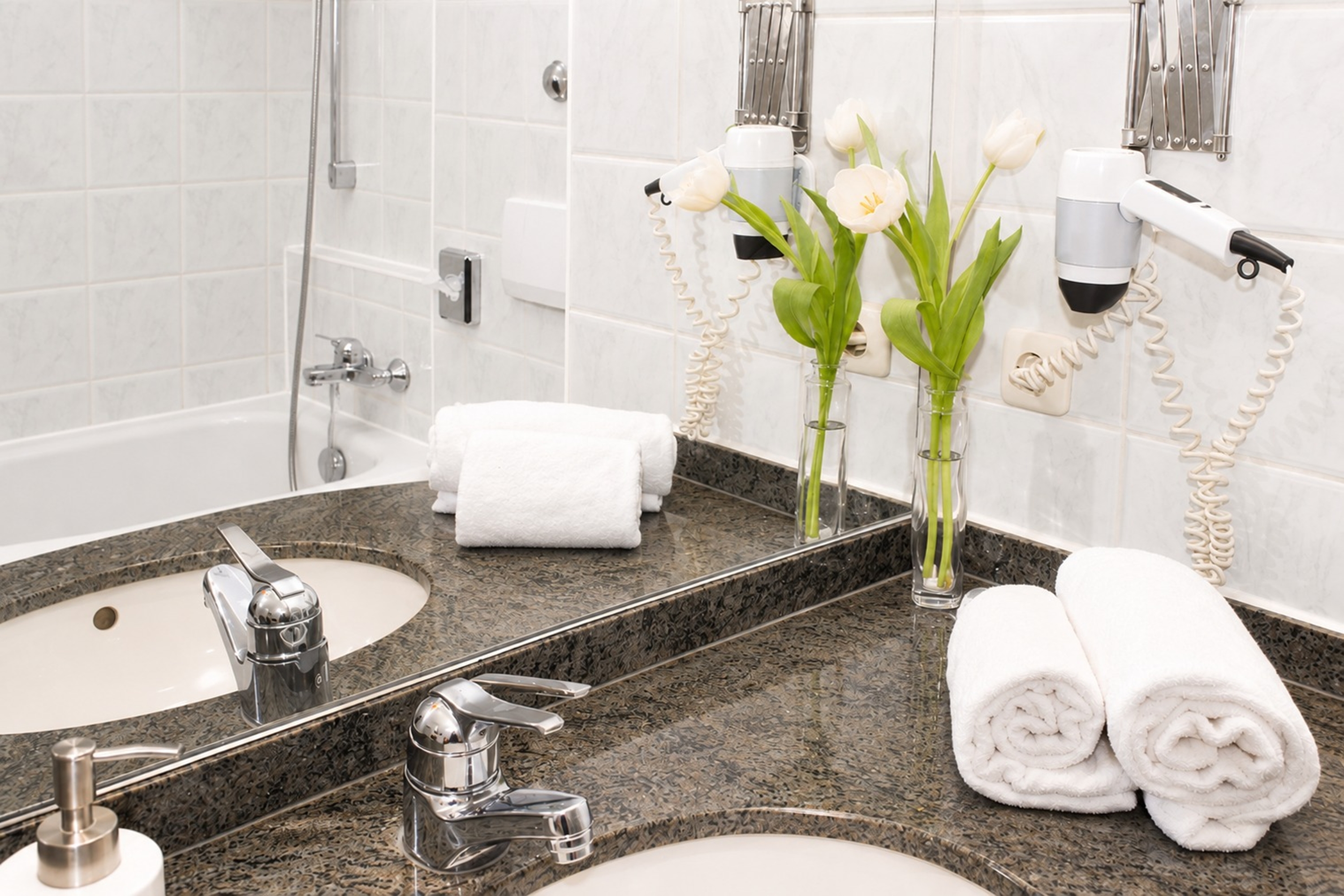 Guest room bath at the QU Hotel, Trademark Collection by Wyndham in Augsburg, Other than US/Canada