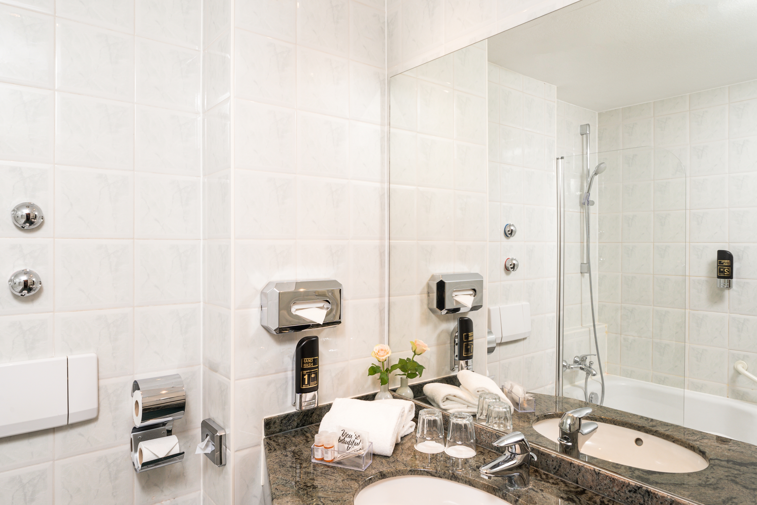 Guest room bath at the QU Hotel, Trademark Collection by Wyndham in Augsburg, Other than US/Canada