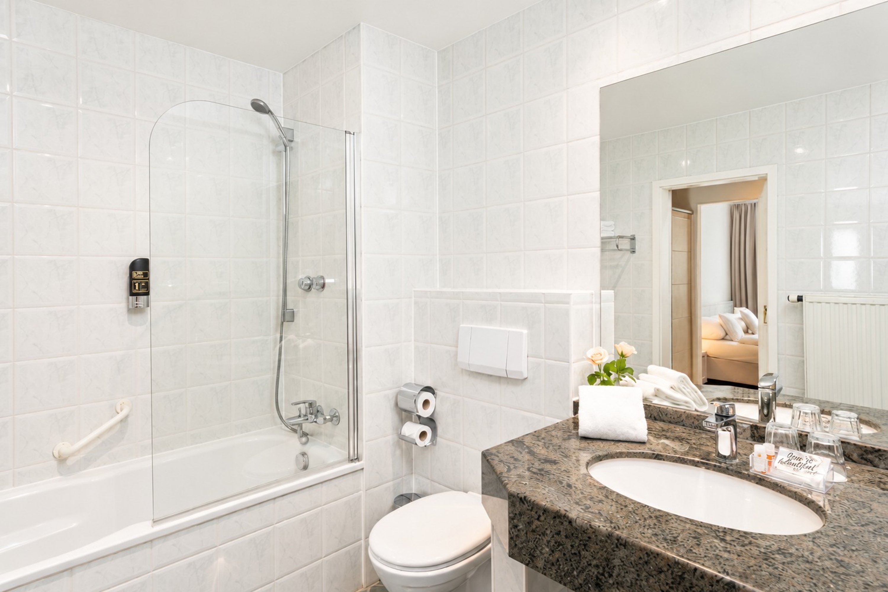 Guest room bath at the QU Hotel, Trademark Collection by Wyndham in Augsburg, Other than US/Canada