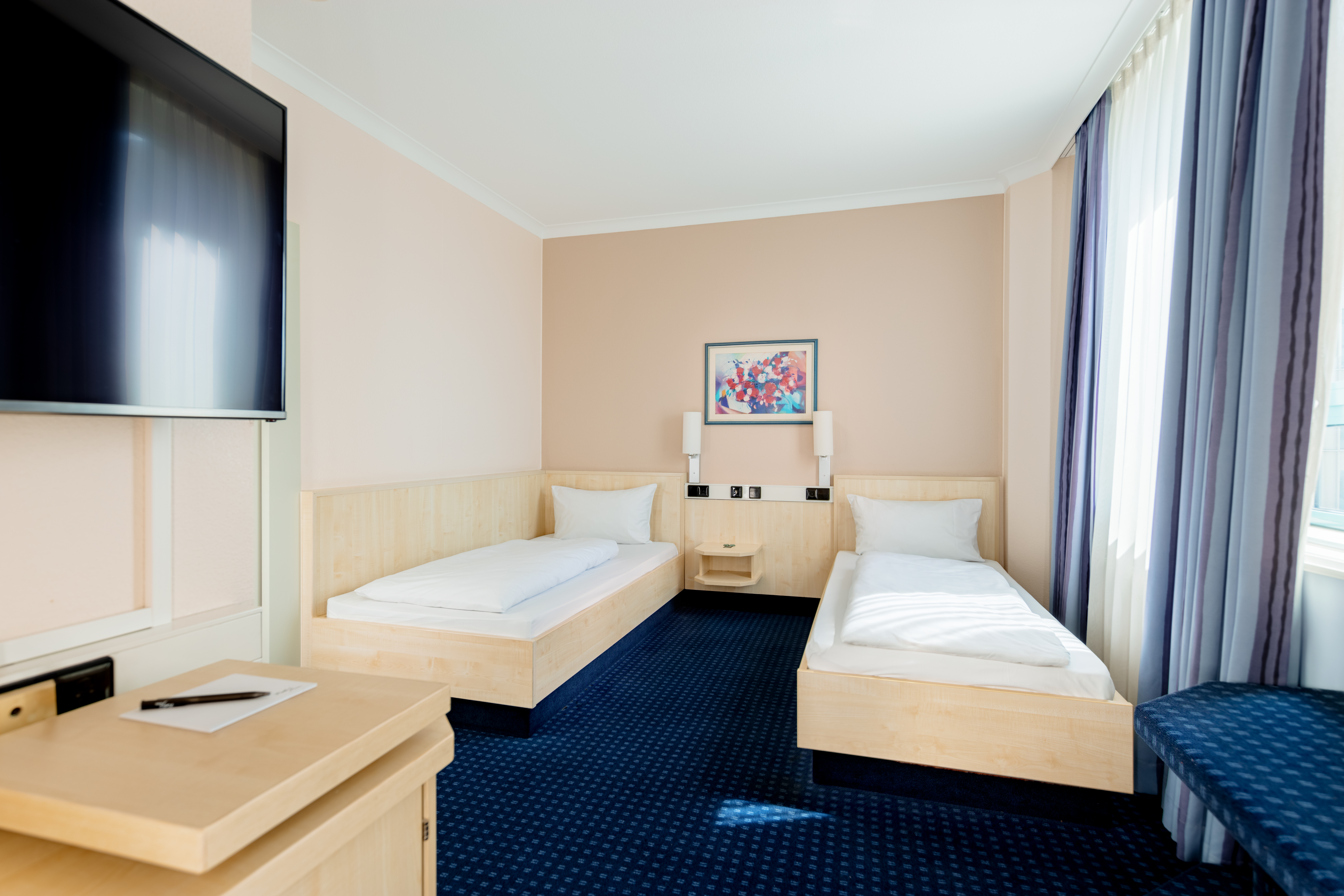 Guest room at the Rugs Hotel Augsburg, Trademark Collection by Wyndham in Augsburg, Other than US/Canada