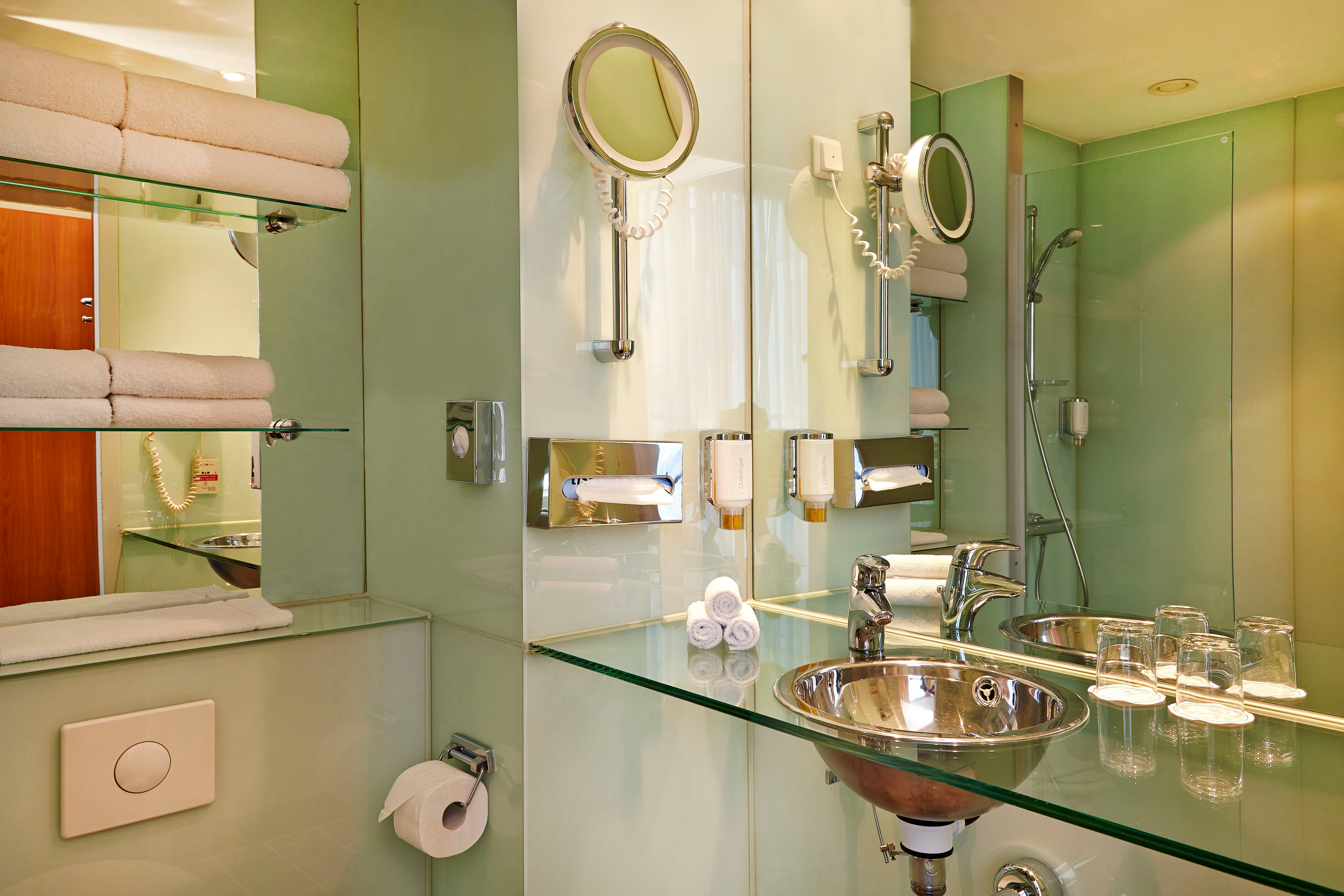 Guest room bath at the H+ Hotel Berlin Mitte in Berlin, Other than US/Canada