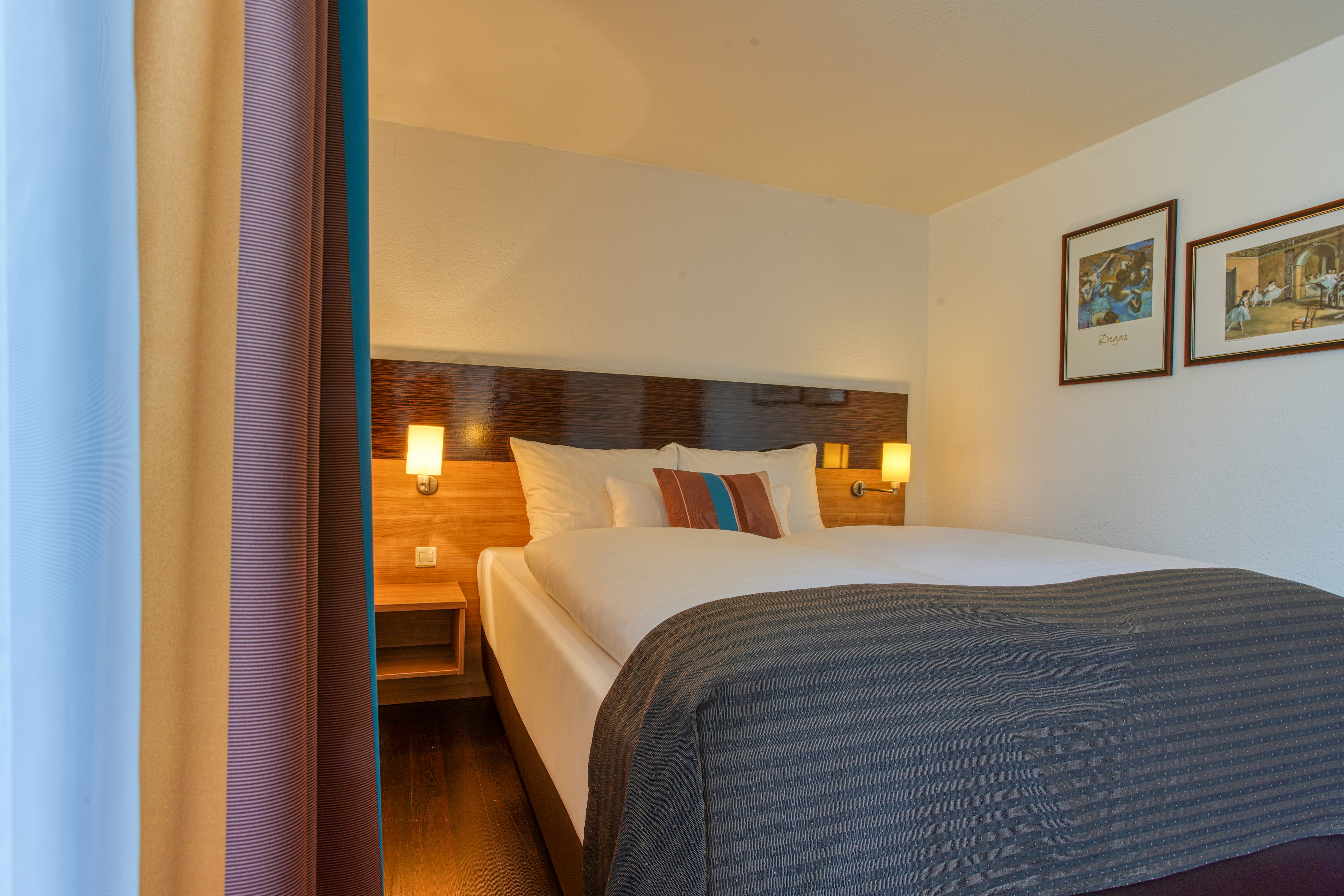 Guest room at the Centro Hotel U-NO1, Trademark Collection by Wyndham in Grossbettlingen, Other than US/Canada