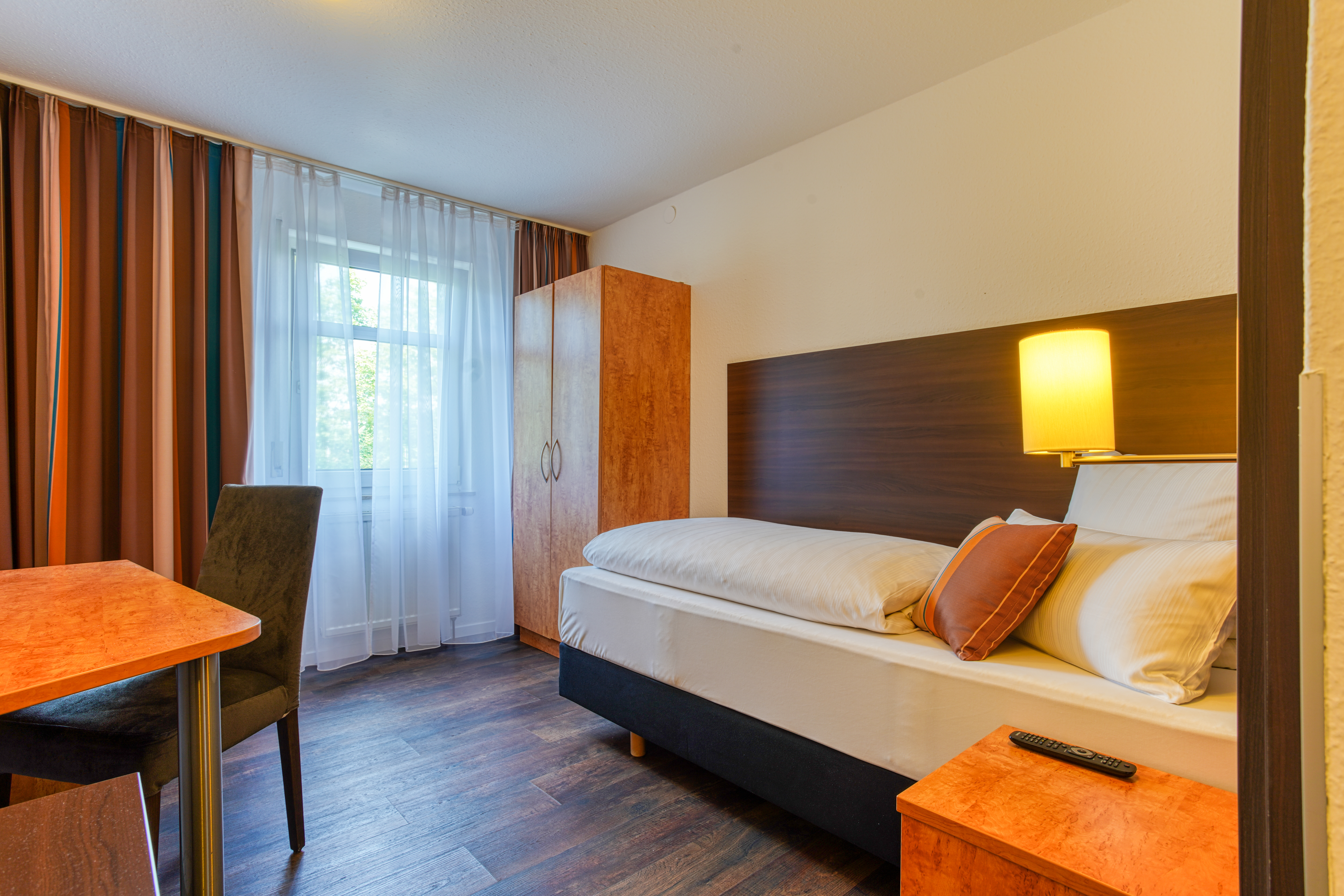 Guest room at the Centro Hotel U-NO1, Trademark Collection by Wyndham in Grossbettlingen, Other than US/Canada