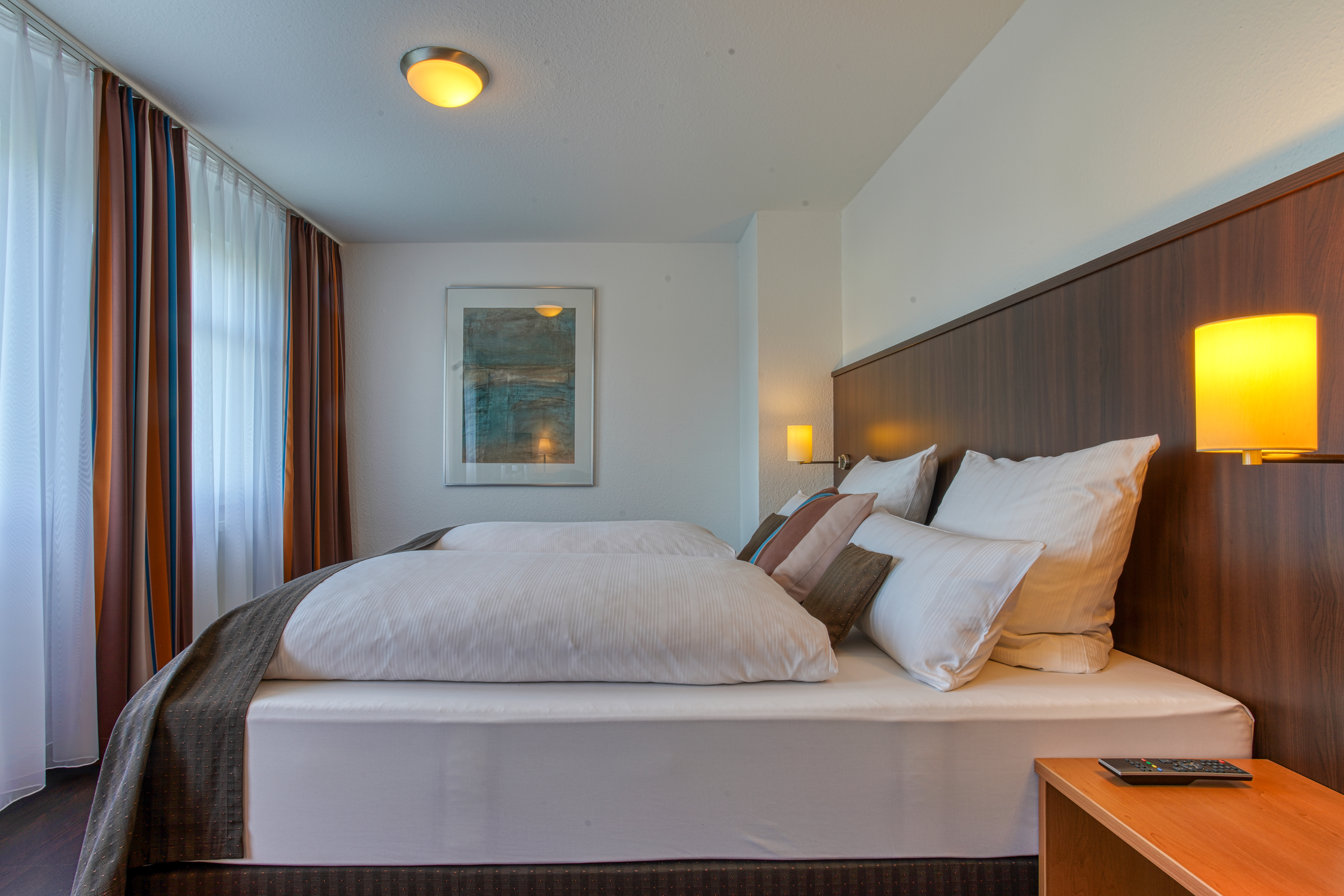 Guest room at the Centro Hotel U-NO1, Trademark Collection by Wyndham in Grossbettlingen, Other than US/Canada