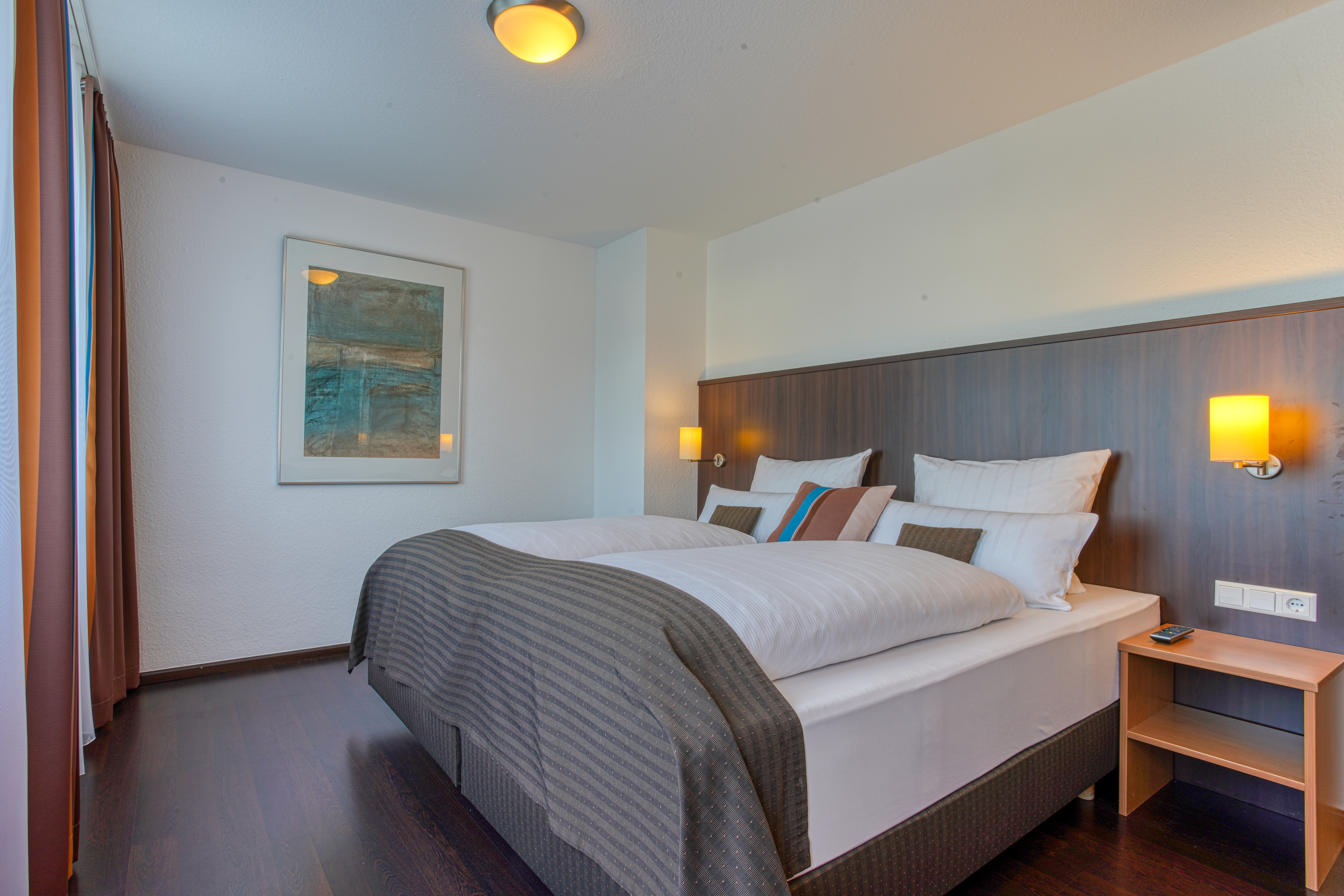 Guest room at the Centro Hotel U-NO1, Trademark Collection by Wyndham in Grossbettlingen, Other than US/Canada