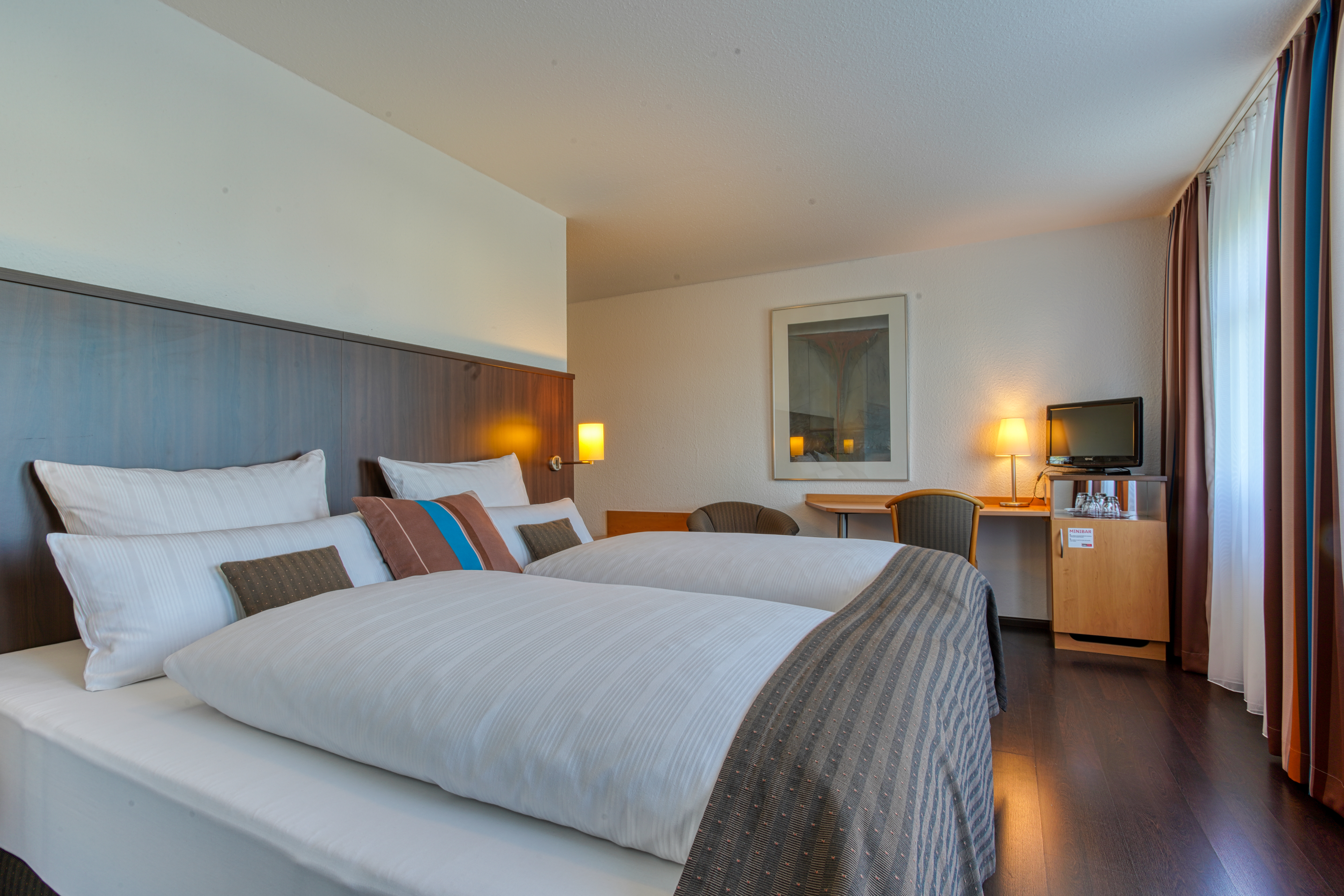 Guest room at the Centro Hotel U-NO1, Trademark Collection by Wyndham in Grossbettlingen, Other than US/Canada