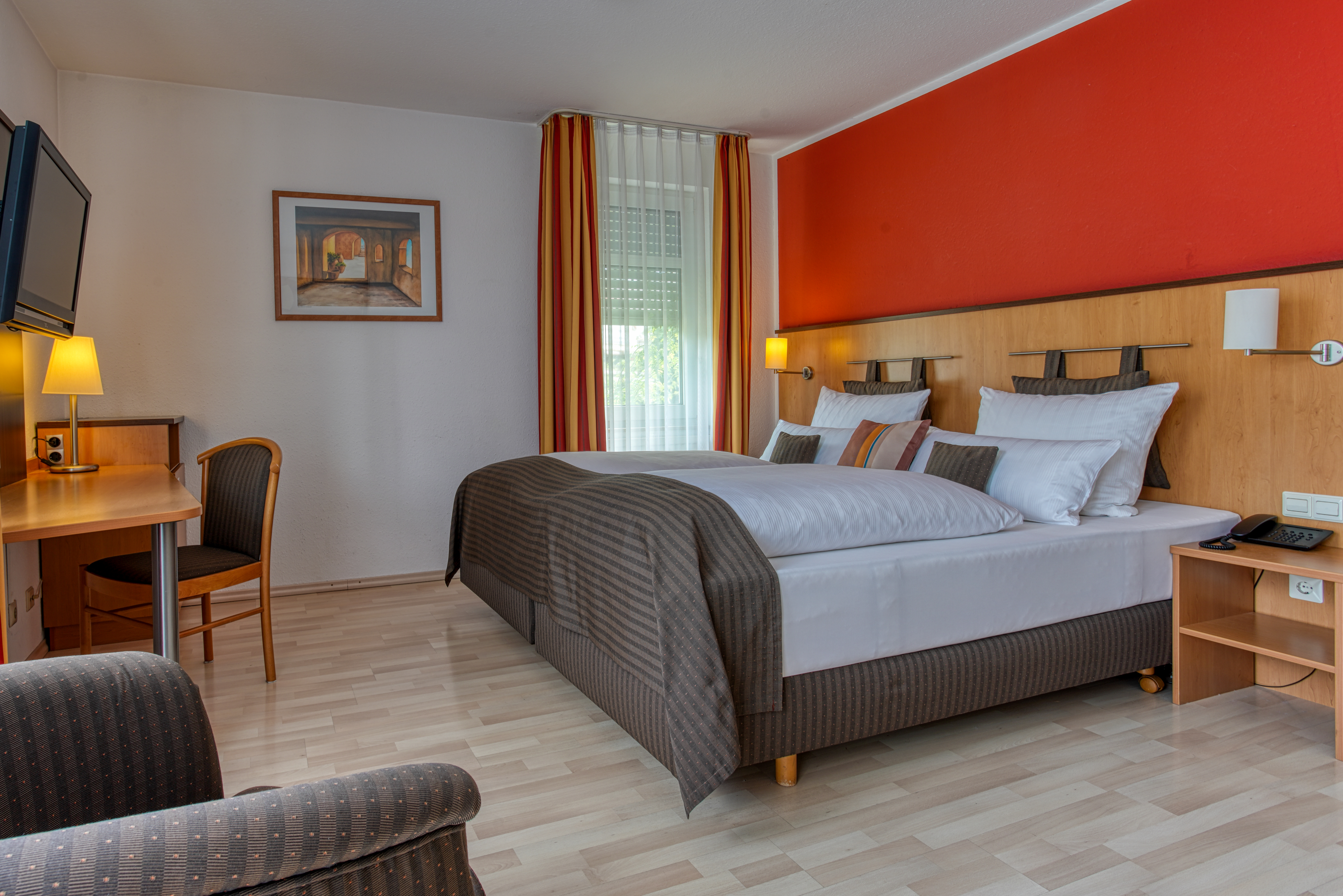 Guest room at the Centro Hotel U-NO1, Trademark Collection by Wyndham in Grossbettlingen, Other than US/Canada