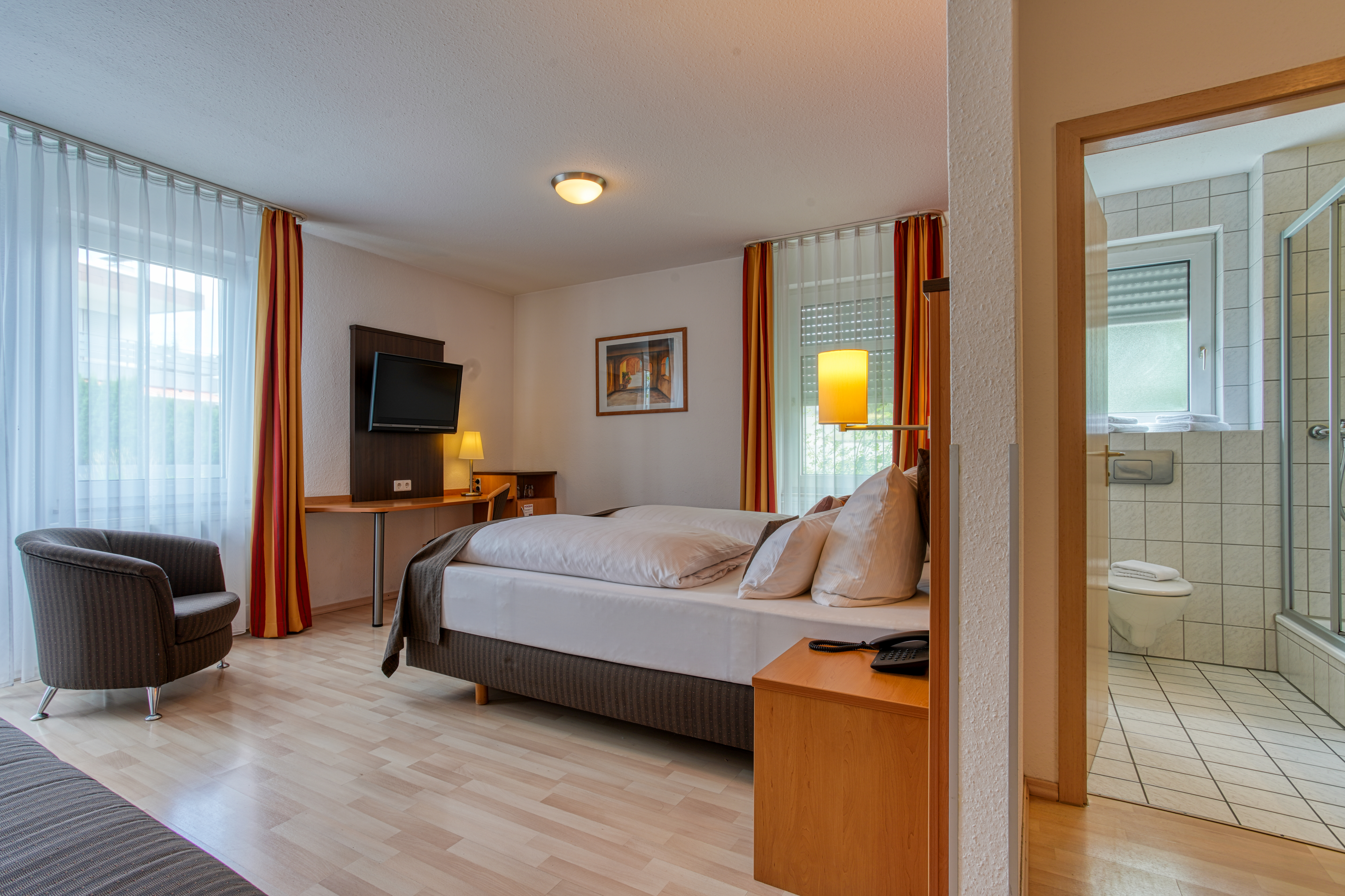 Guest room at the Centro Hotel U-NO1, Trademark Collection by Wyndham in Grossbettlingen, Other than US/Canada