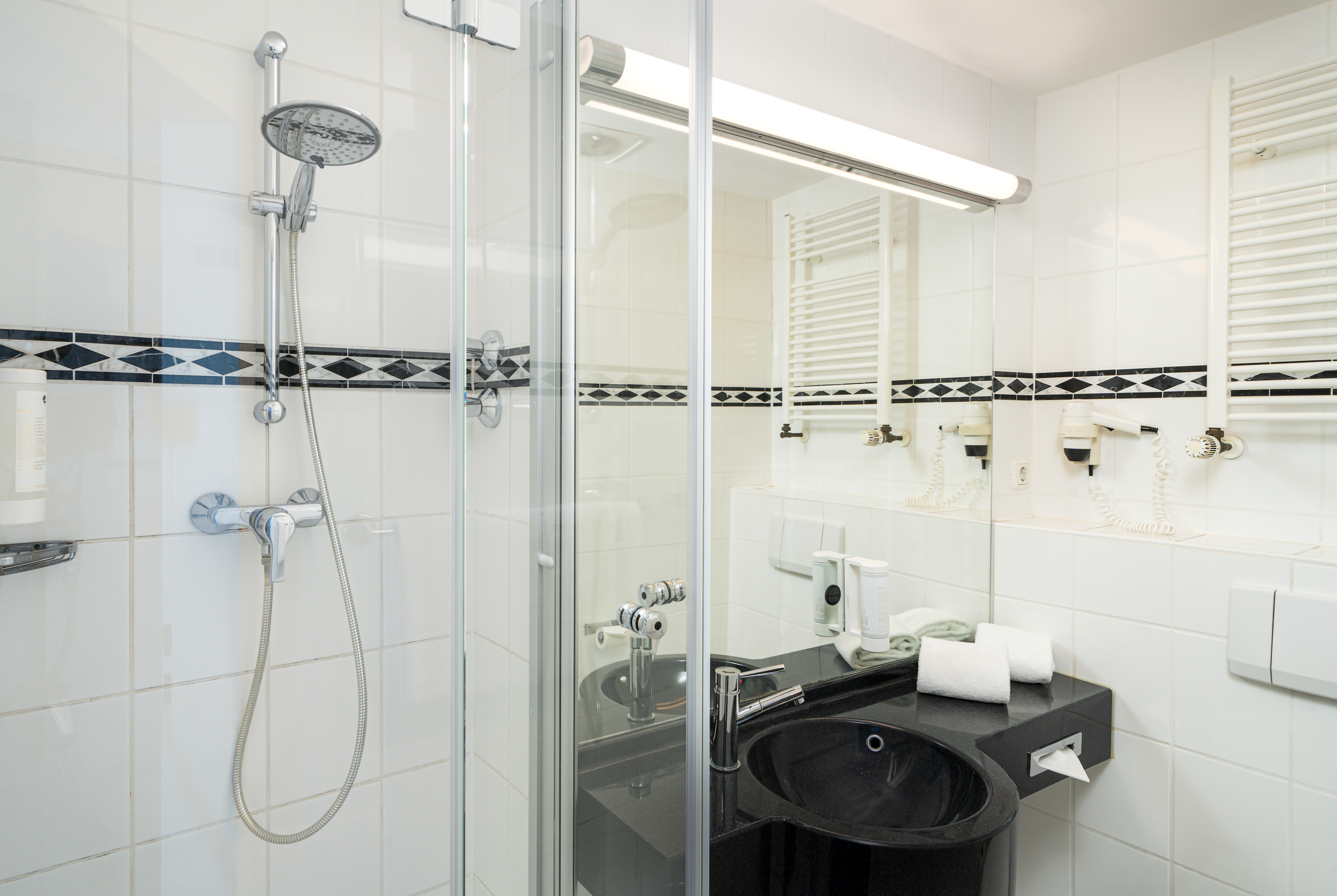 Guest room bath at the elaya hotel hannover city, Trademark by Wyndham in Hannover, Other than US/Canada