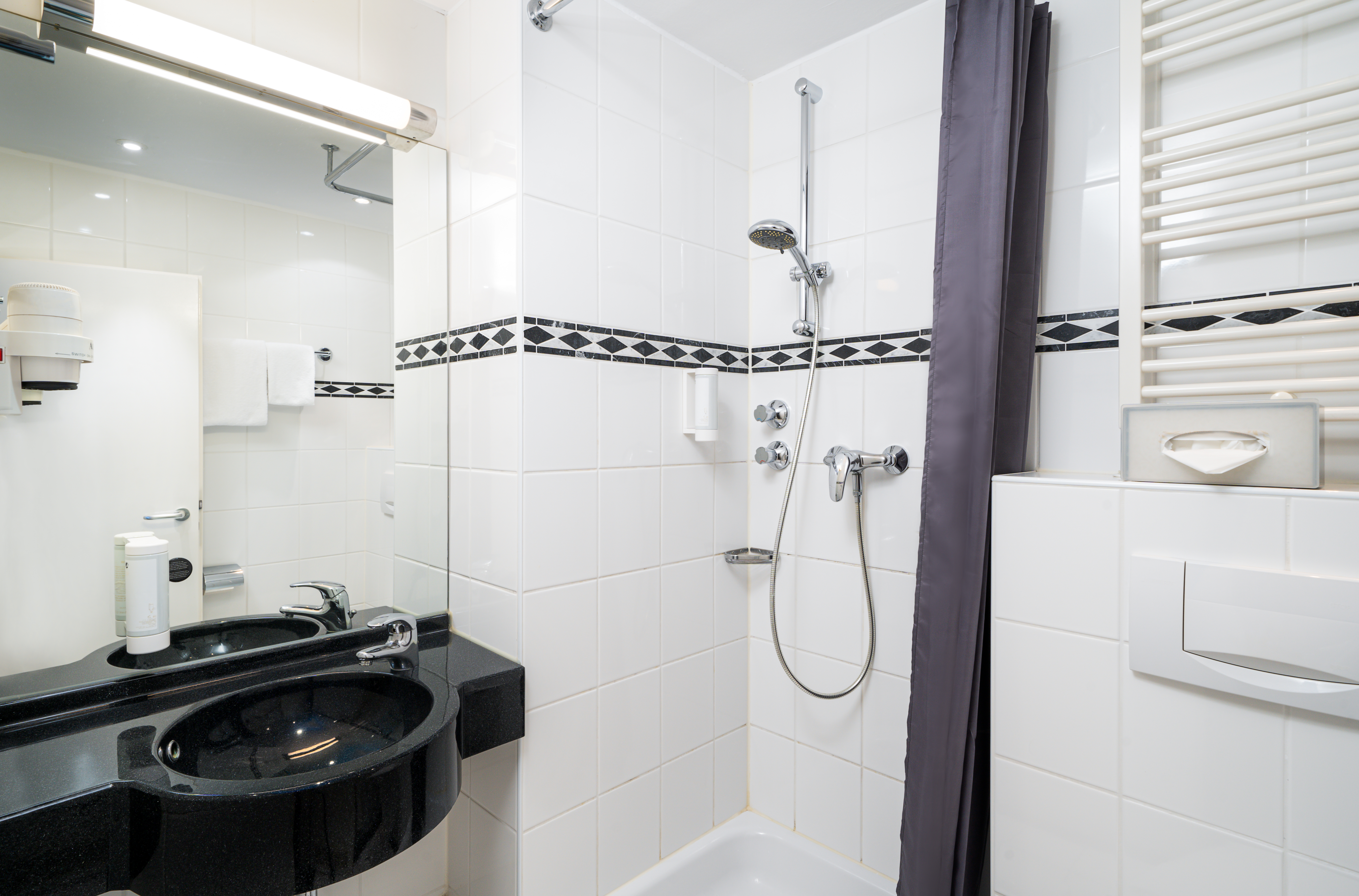 Guest room bath at the elaya hotel hannover city, Trademark by Wyndham in Hannover, Other than US/Canada