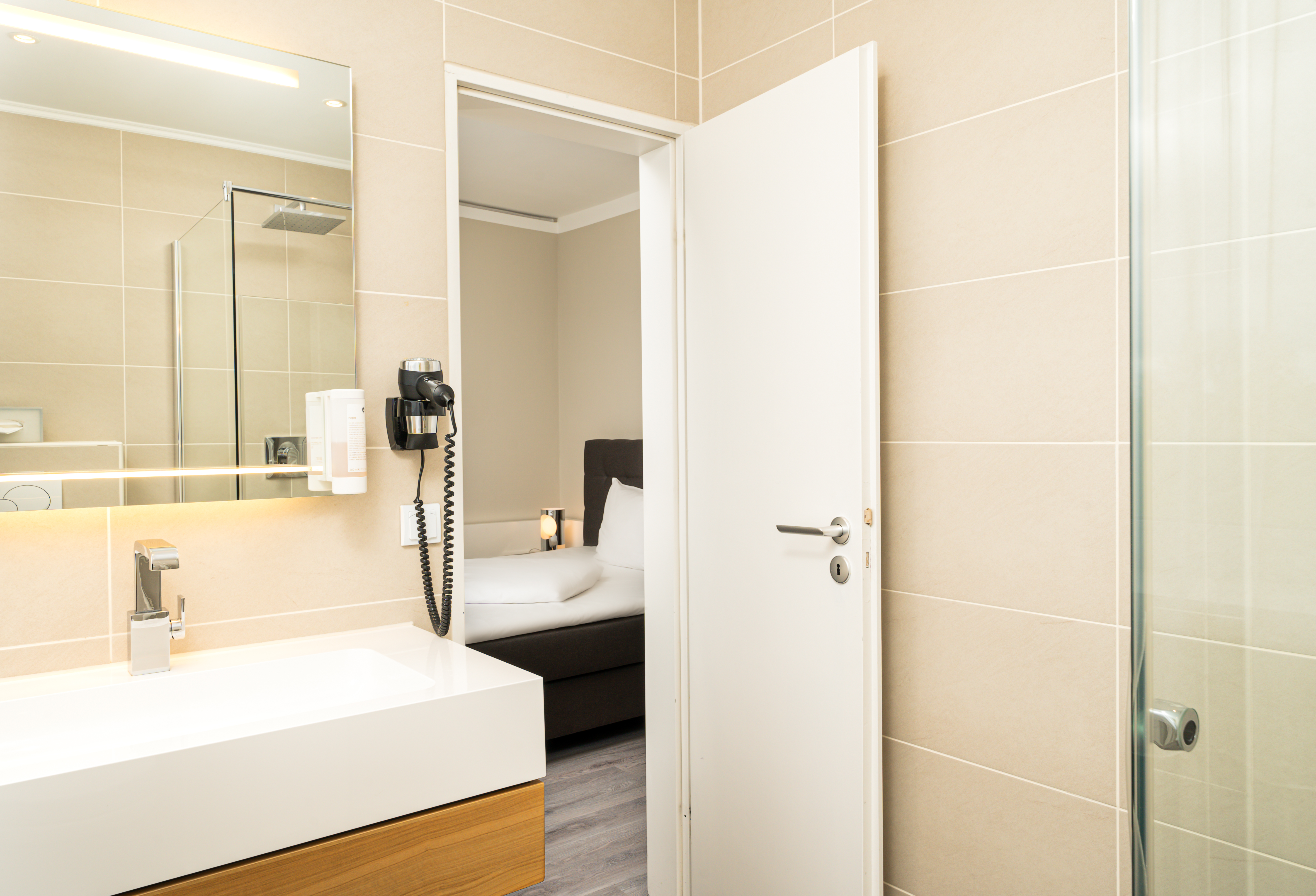 Guest room bath at the elaya hotel hannover city, Trademark by Wyndham in Hannover, Other than US/Canada