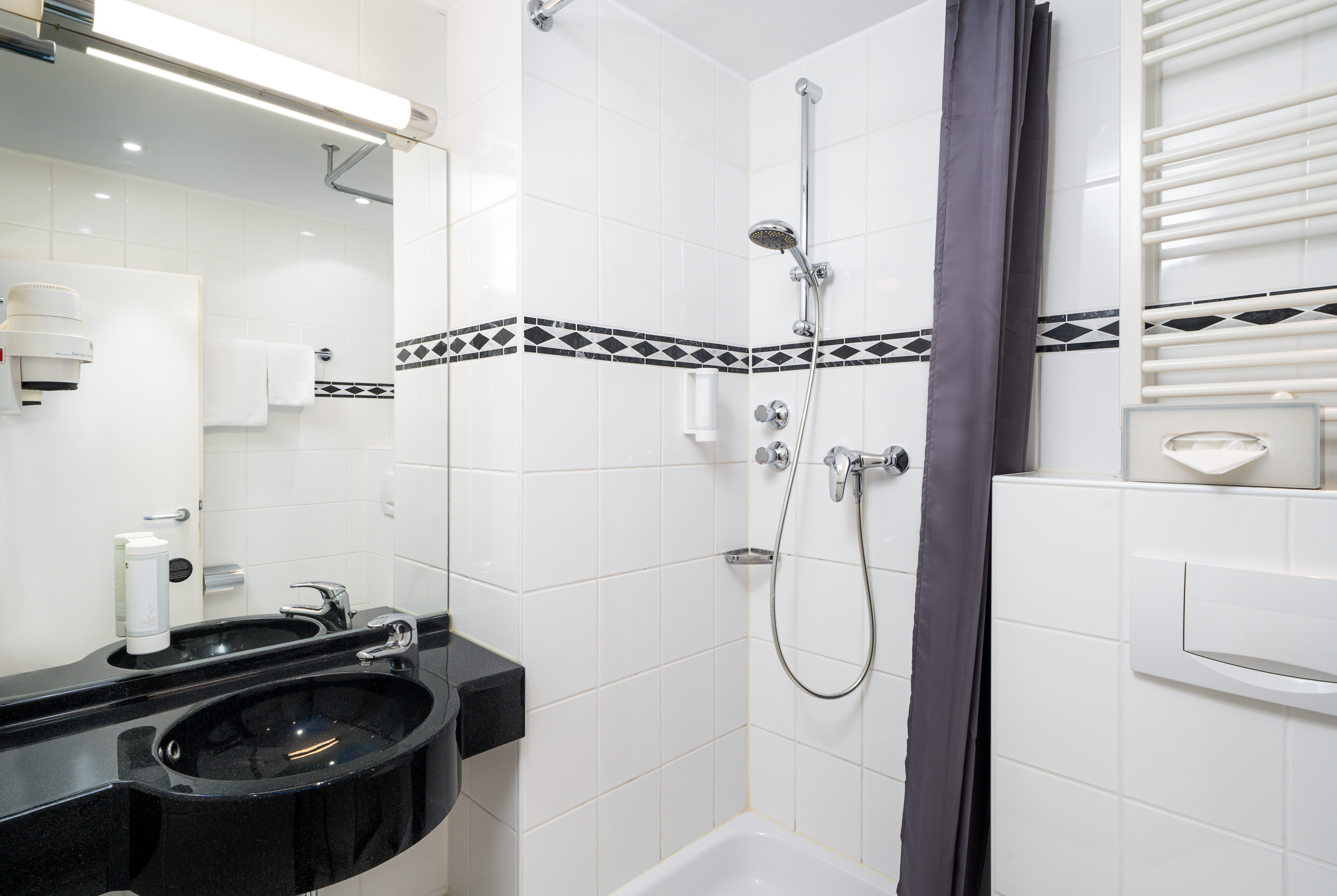 Guest room bath at the elaya hotel hannover city, Trademark by Wyndham in Hannover, Other than US/Canada