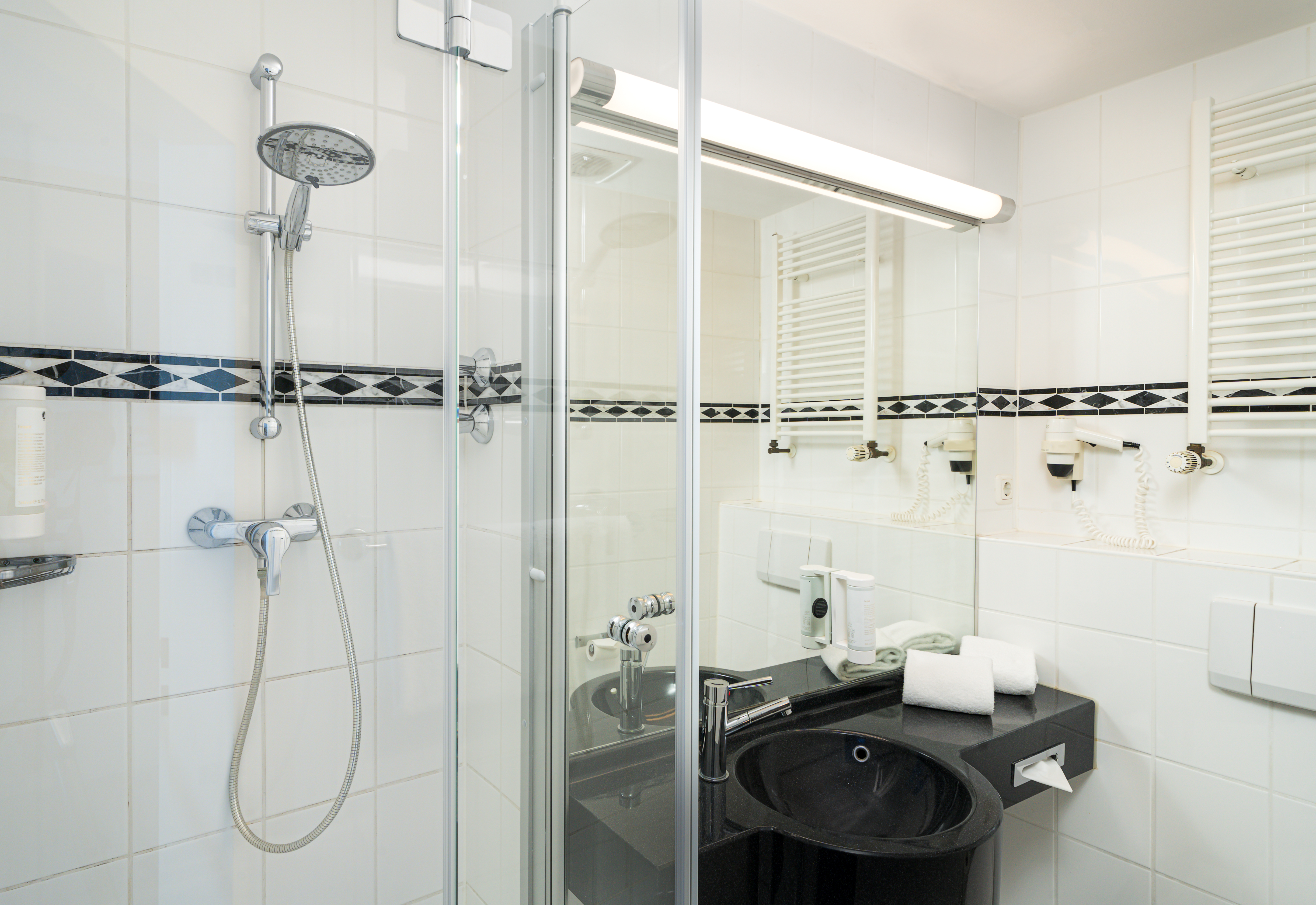 Guest room bath at the elaya hotel hannover city, Trademark by Wyndham in Hannover, Other than US/Canada