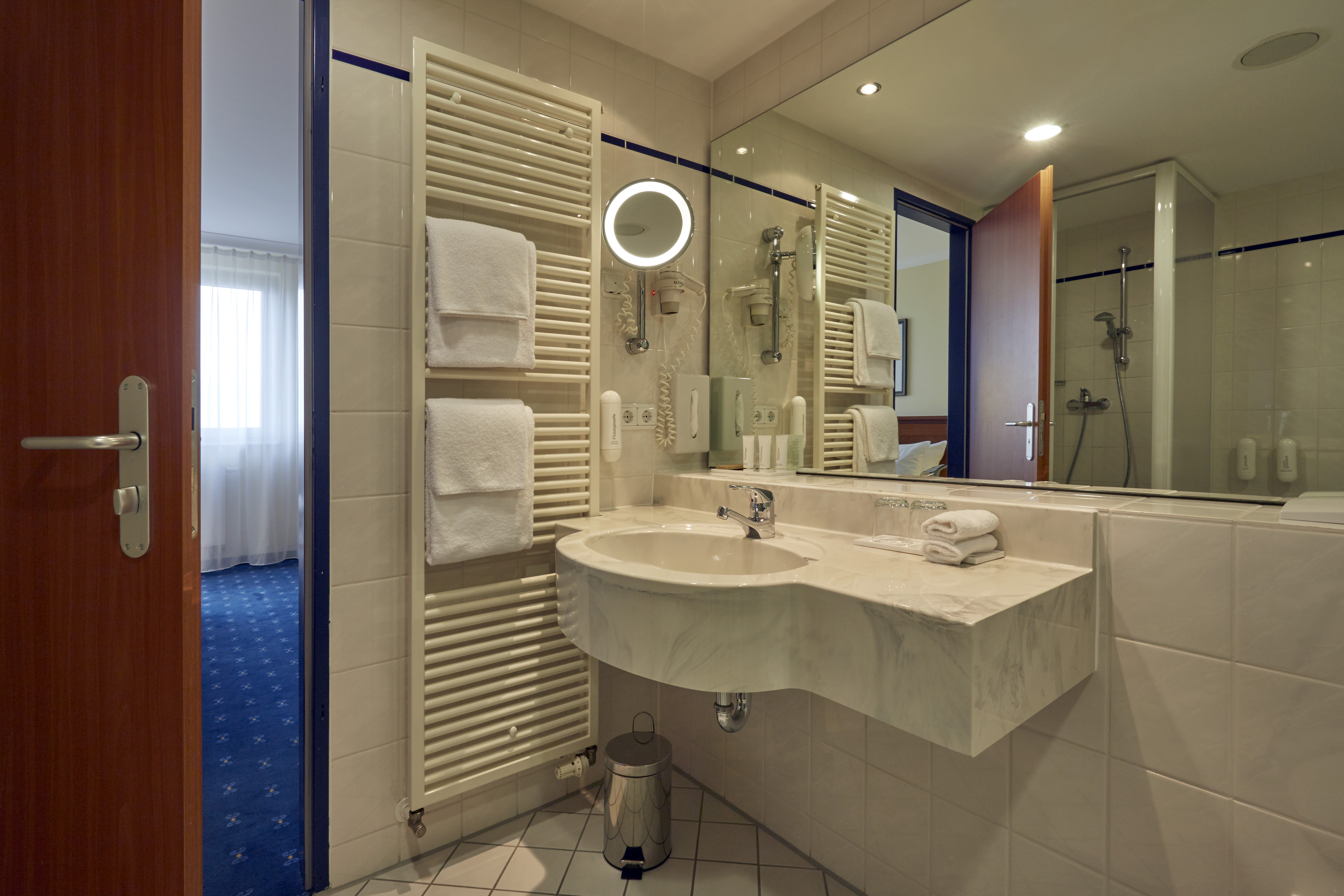 Guest room bath at the H4 Hotel Kassel in Kassel, Other than US/Canada