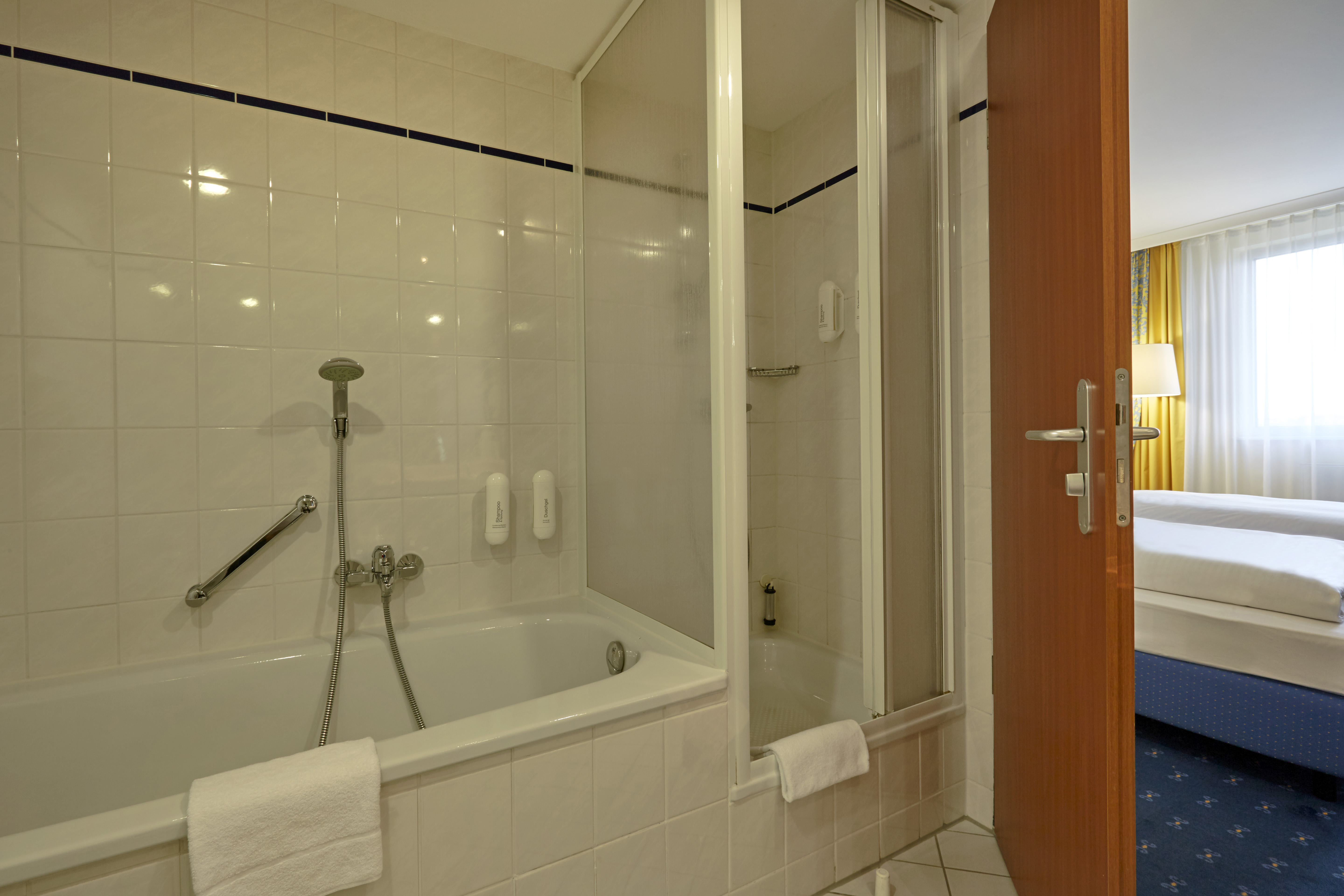 Guest room bath at the H4 Hotel Kassel in Kassel, Other than US/Canada