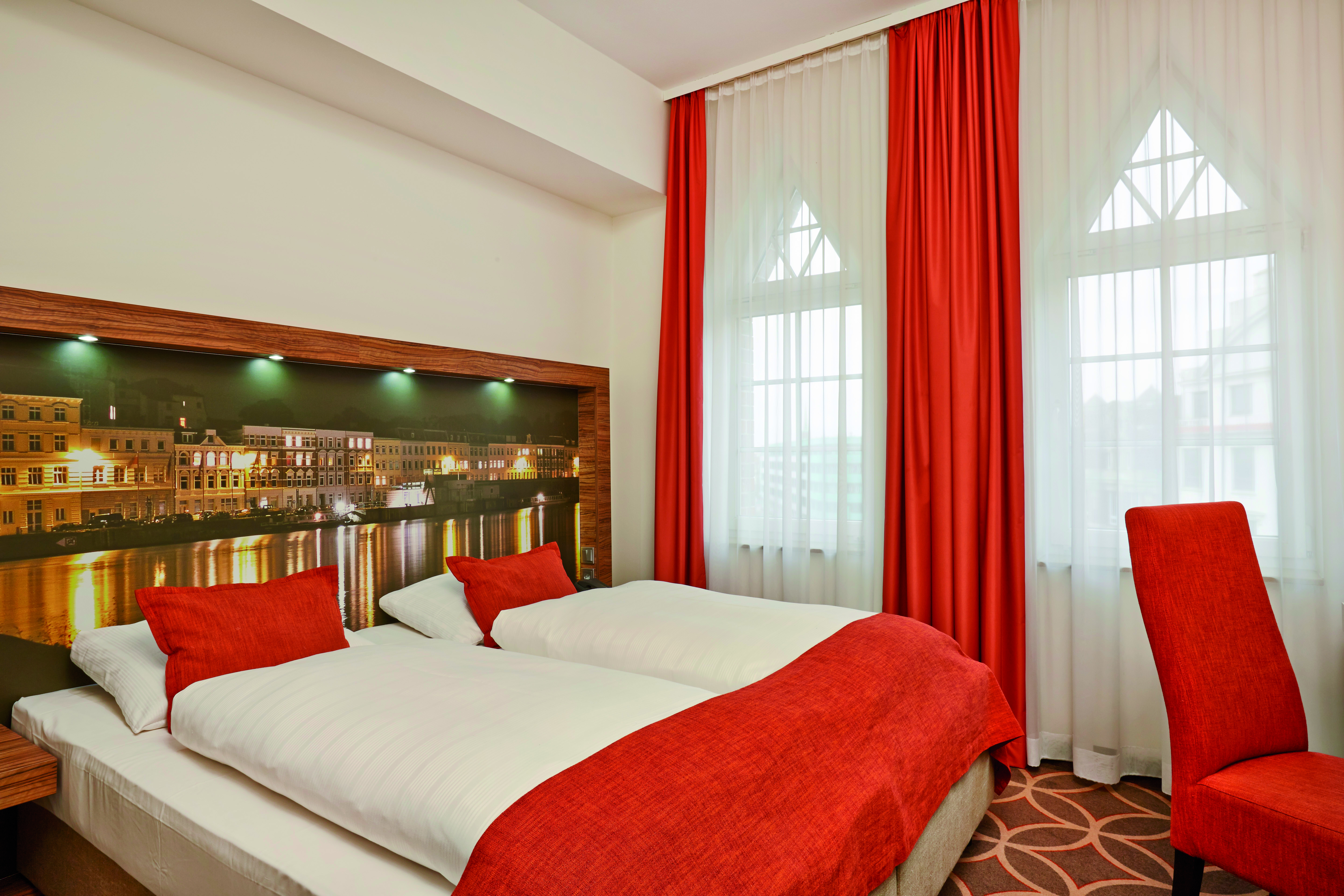 Guest room at the H+ Hotel Lubeck in Luebeck, Other than US/Canada