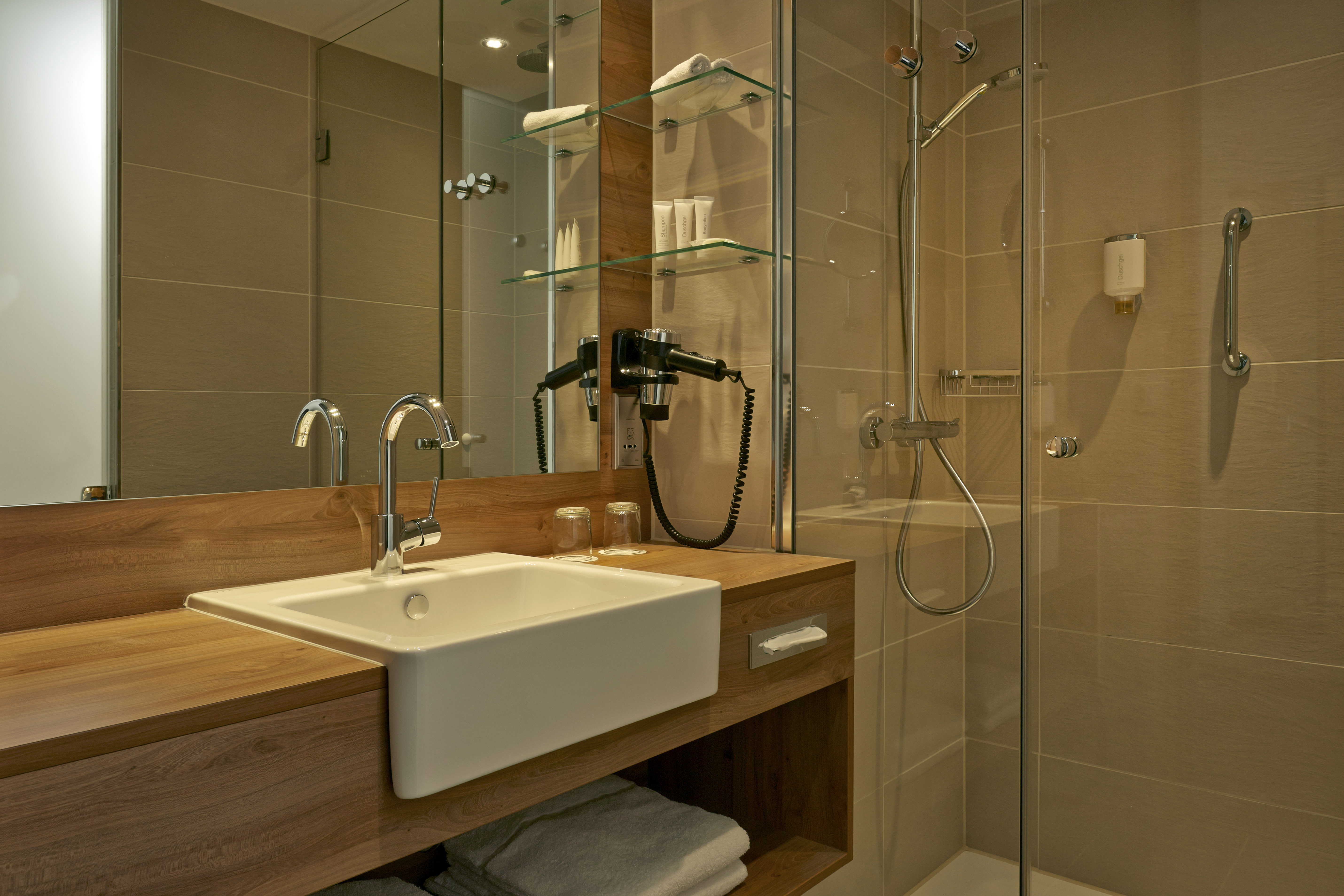 Guest room bath at the H4 Hotel Munchen Messe in Munich, Other than US/Canada