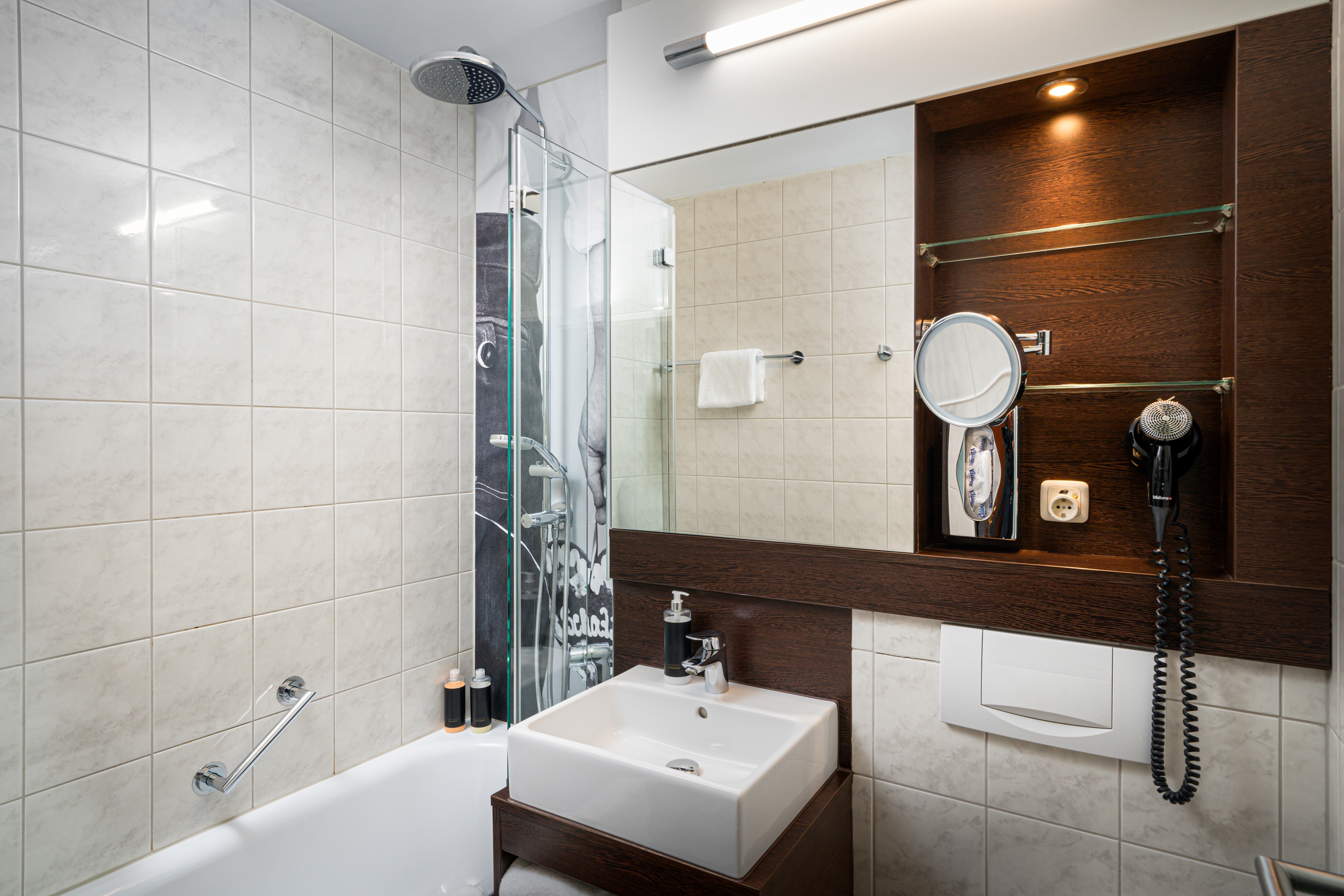 Guest room bath at the The Rilano Munich, Trademark Collection by Wyndham in Munich, Other than US/Canada