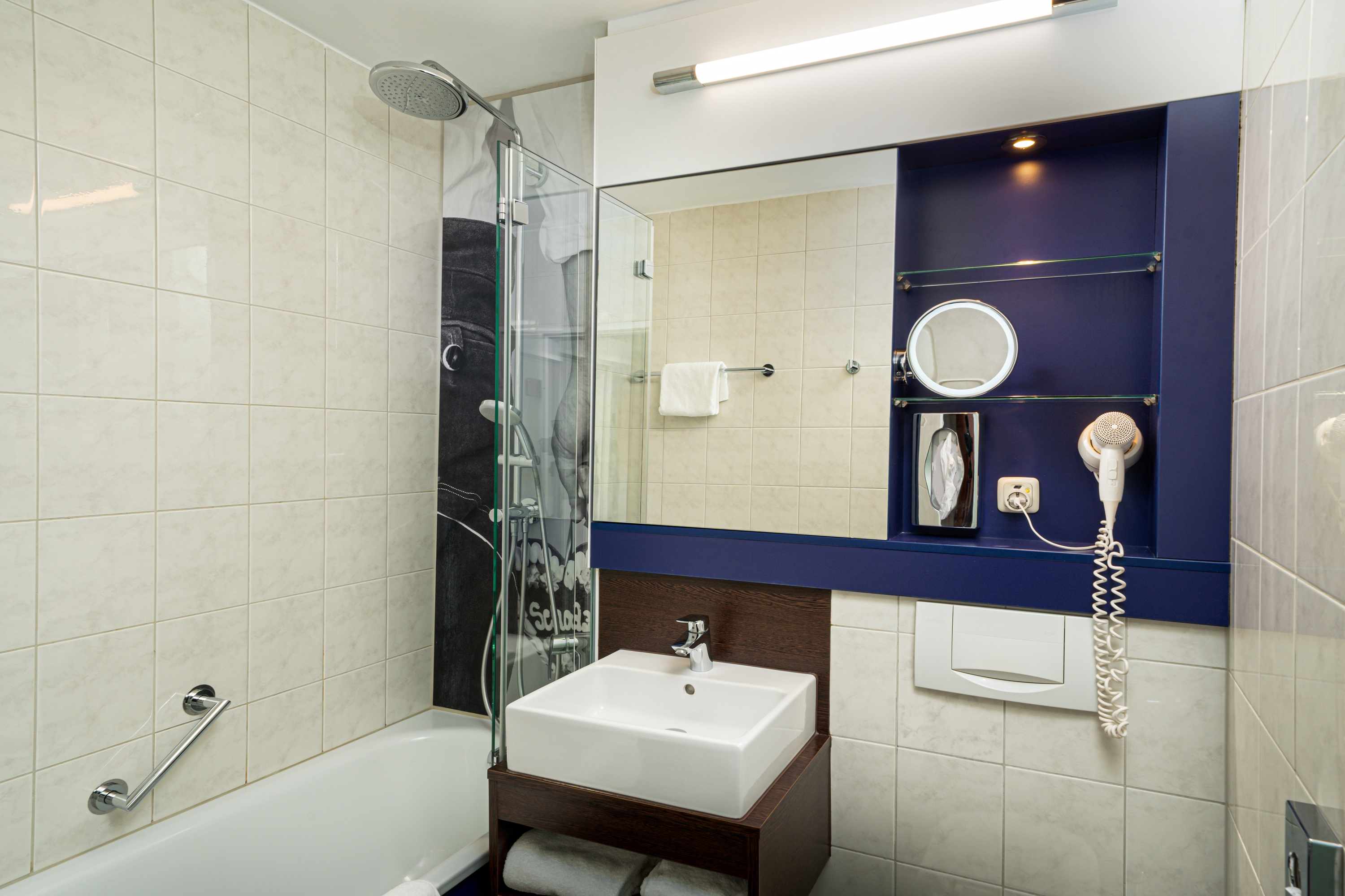 Guest room bath at the The Rilano Munich, Trademark Collection by Wyndham in Munich, Other than US/Canada