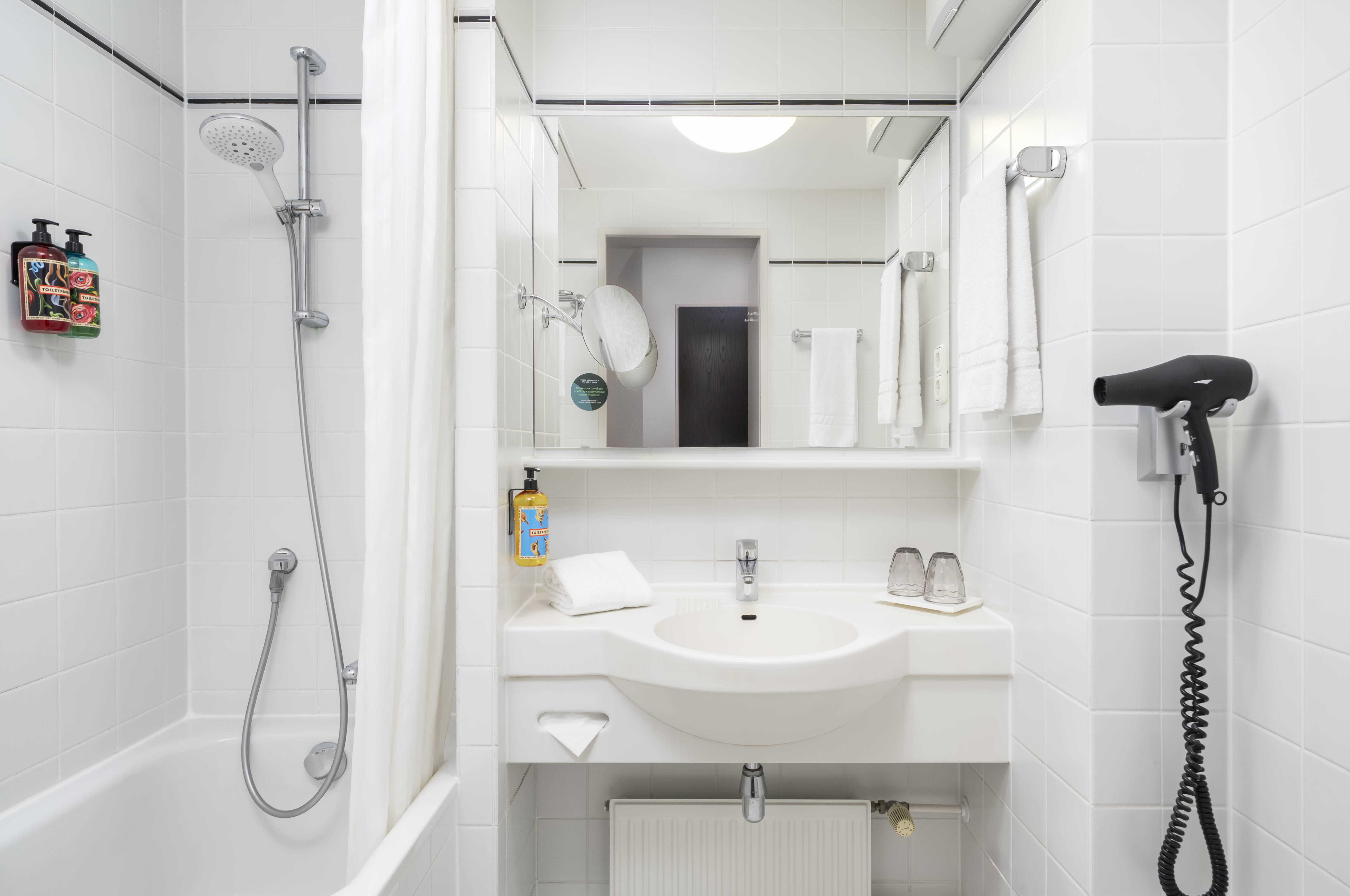 Guest room bath at the elaya hotel noerdlingen, Trademark by Wyndham in Noerdlingen, Other than US/Canada