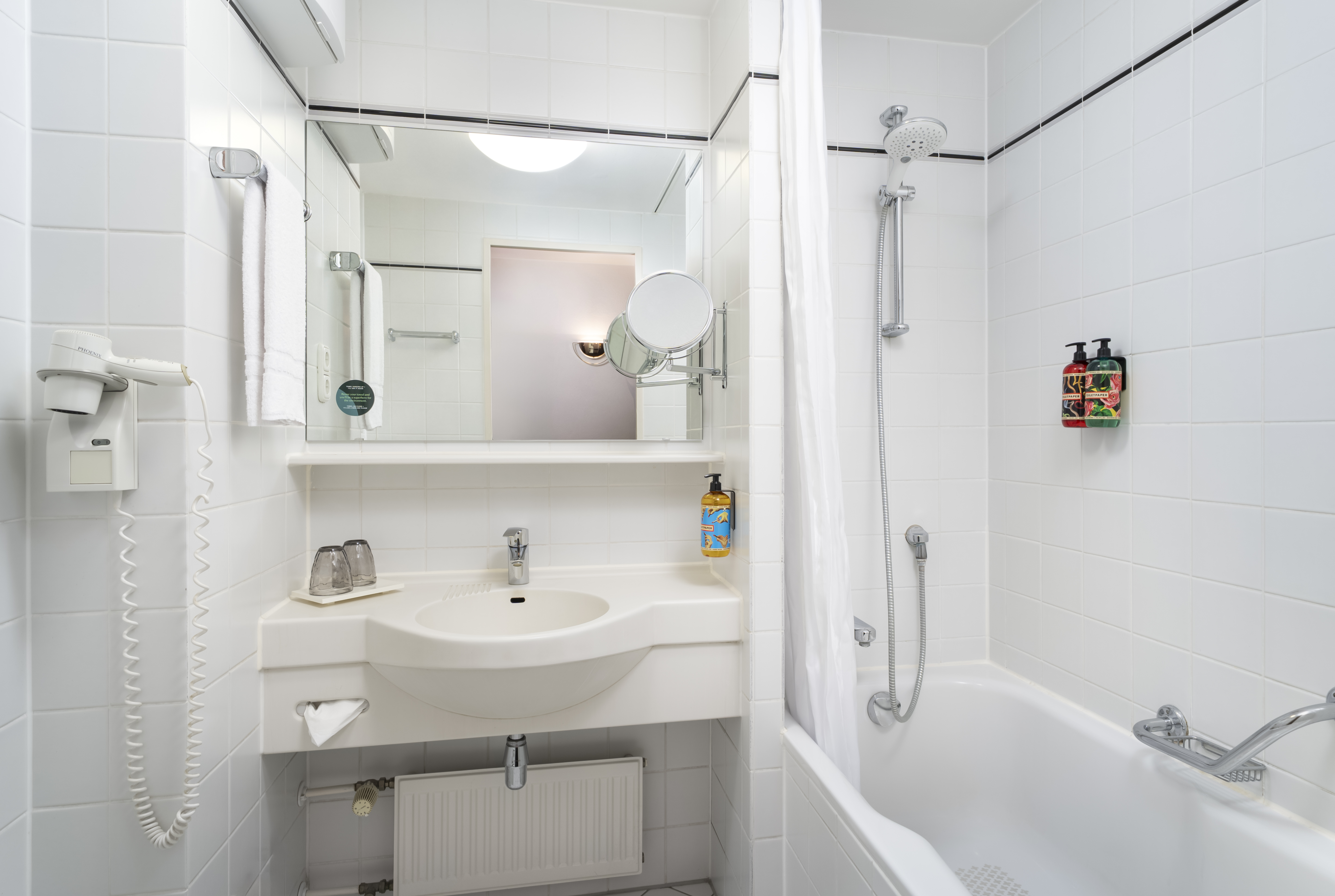 Guest room bath at the elaya hotel noerdlingen, Trademark by Wyndham in Noerdlingen, Other than US/Canada