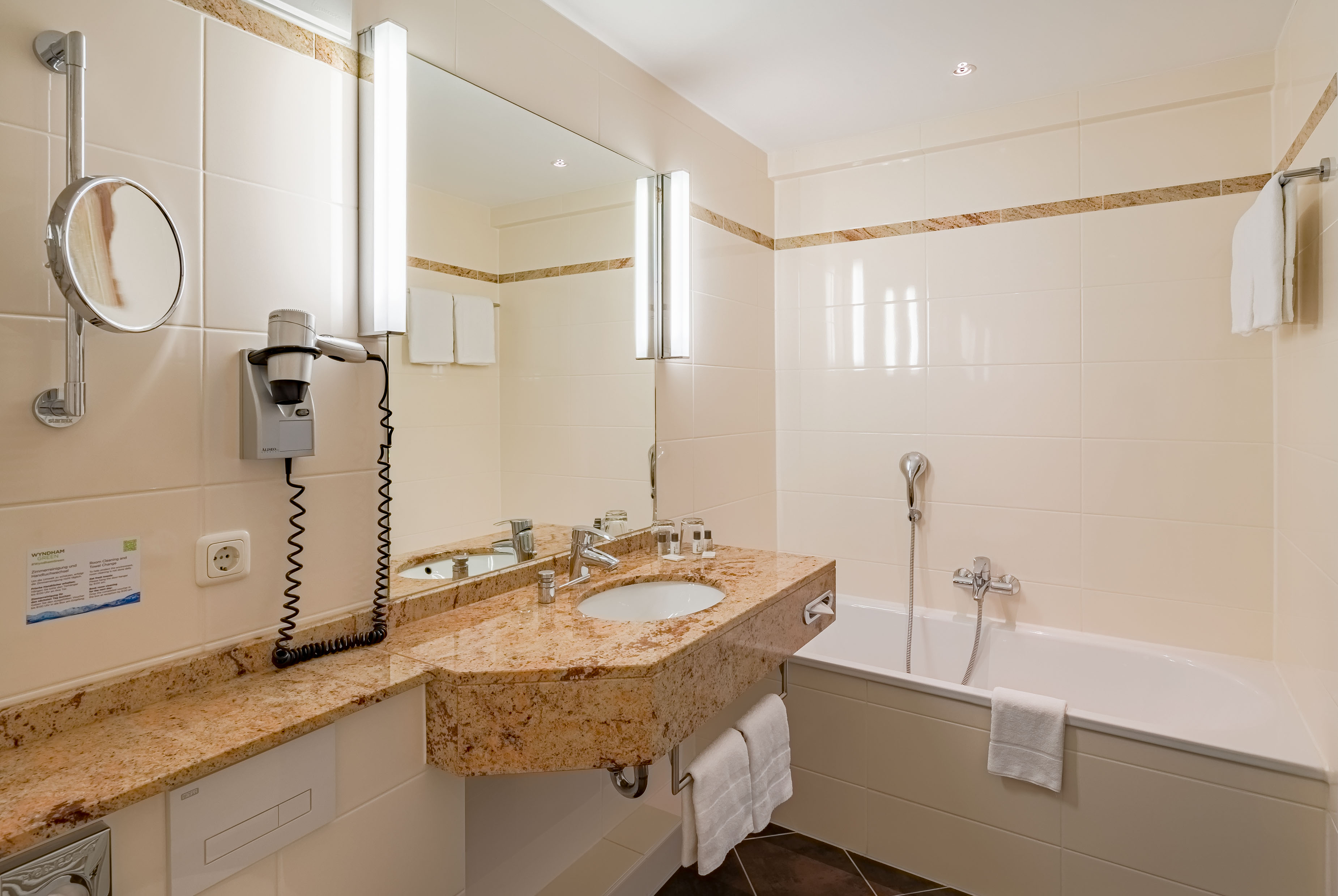 Guest room bath at the Aspire Oldenburg, Trademark Collection by Wyndham in Oldenburg, Other than US/Canada